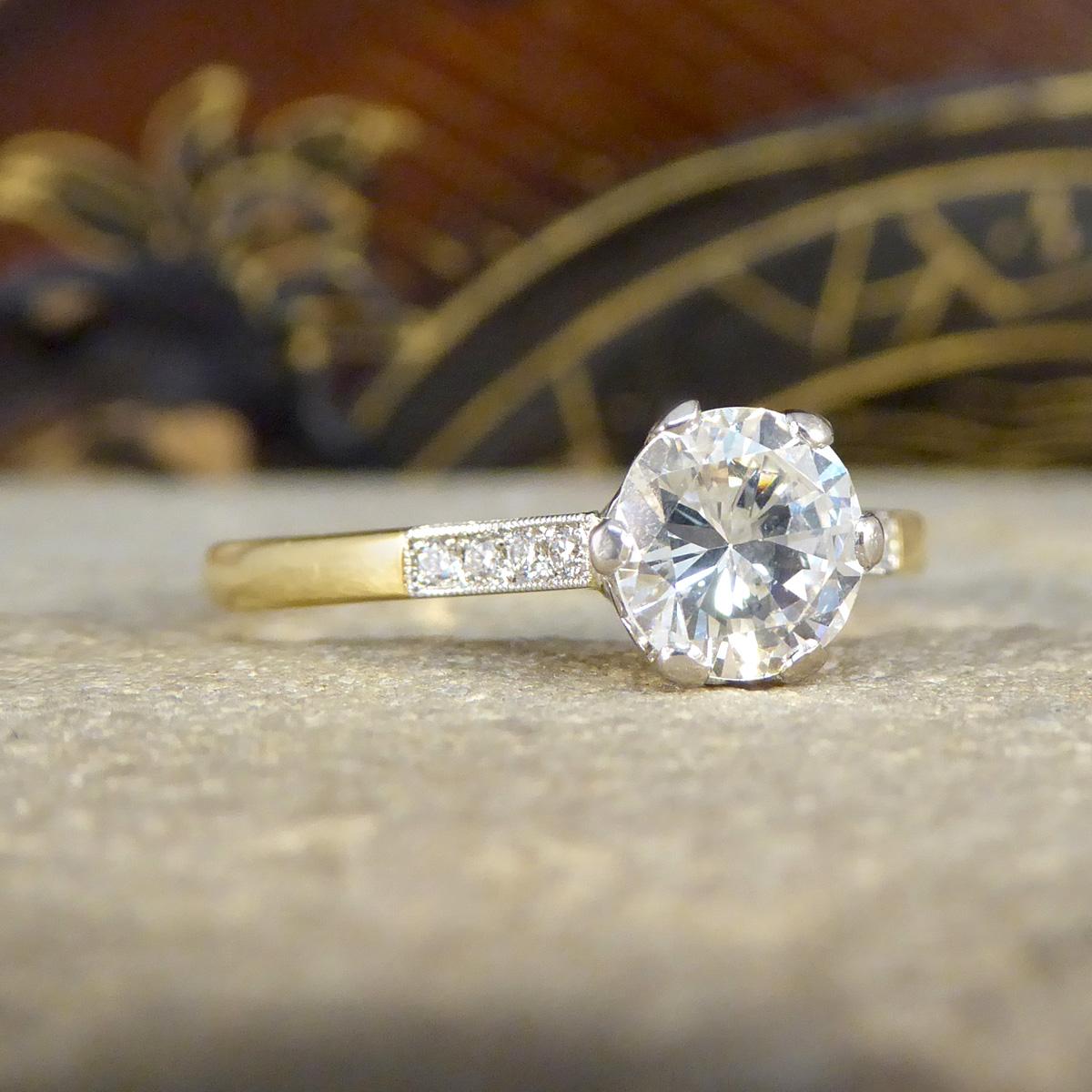 A beautifully classic Diamond engagement ring. Taking centre stage in this ring is a Brilliant Cut Diamond weighing approximately 0.90ct in a 6 claw setting with a beautiful aesthetic assessed as SI2 in clarity and I in colour. The Diamond is sat in