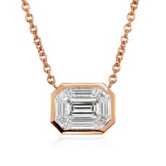 0.90ct Emerald and Trapezoid Cut Mosaic Diamond Pendant in 14K Rose Gold 0.90ct Emerald and Trapezoid Cut Mosaic Diamond Pendant in 14K Rose Gold