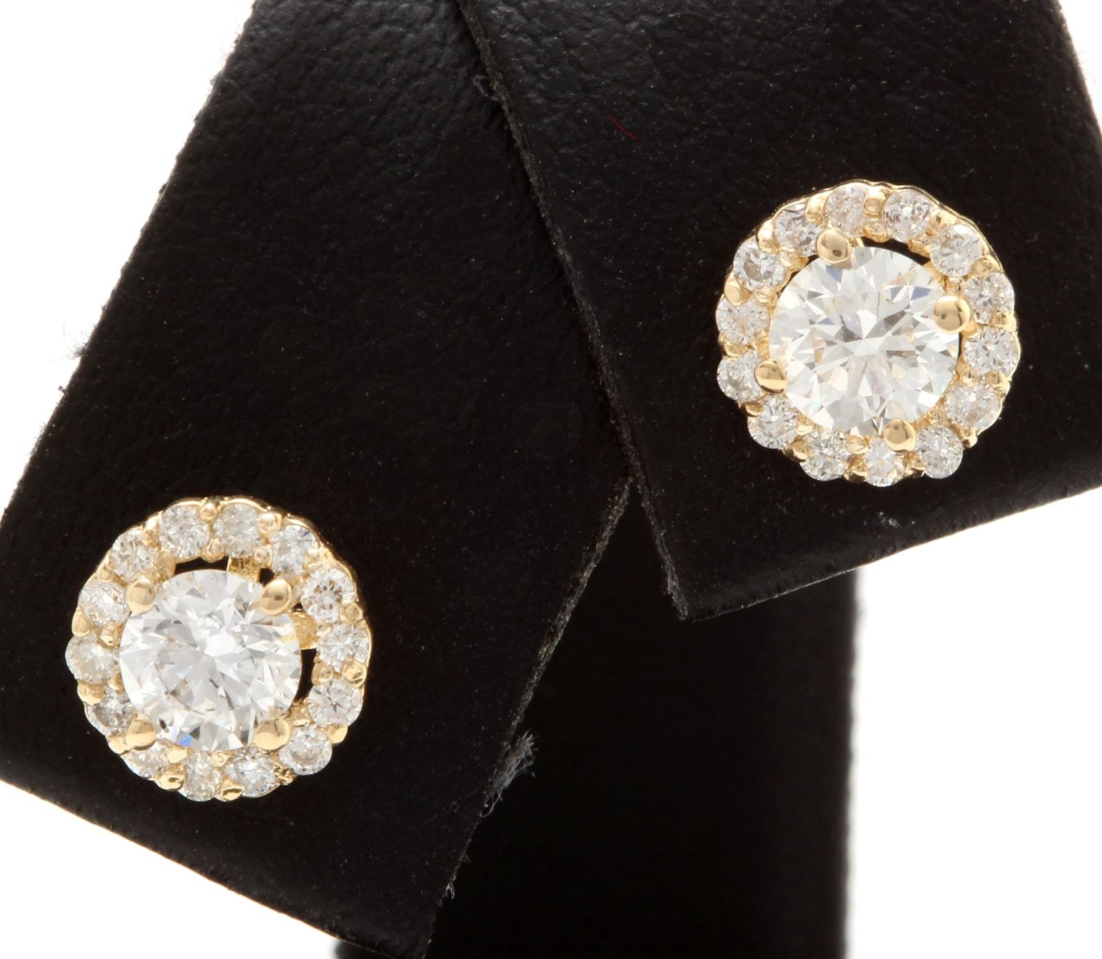 Exquisite .90 Carats Natural Diamond 14K Solid Yellow Gold Stud Earrings

Amazing looking piece! 

Suggested Replacement Value Approx. $3,900.00

Total Natural Round Cut Diamonds Weight: Approx. .90 Carats (both earrings) SI / G-H

Diameter of the