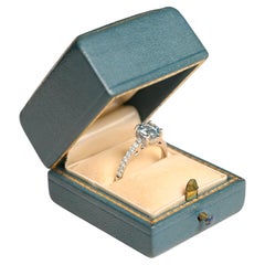 Bague de fiançailles en or blanc 18 carats avec aigue-marine de taille ronde (environ 0,9 carat)