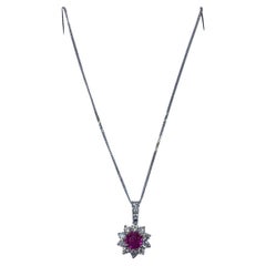 0.90ct Ruby and diamonds cluster halo Pendant Necklace Chain in 18k white gold.