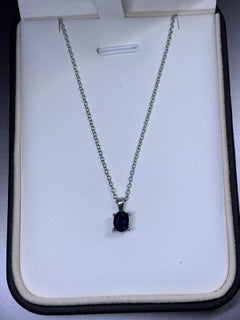 0.90ct Sapphire blue Ceylon pendant in 18k white gold.