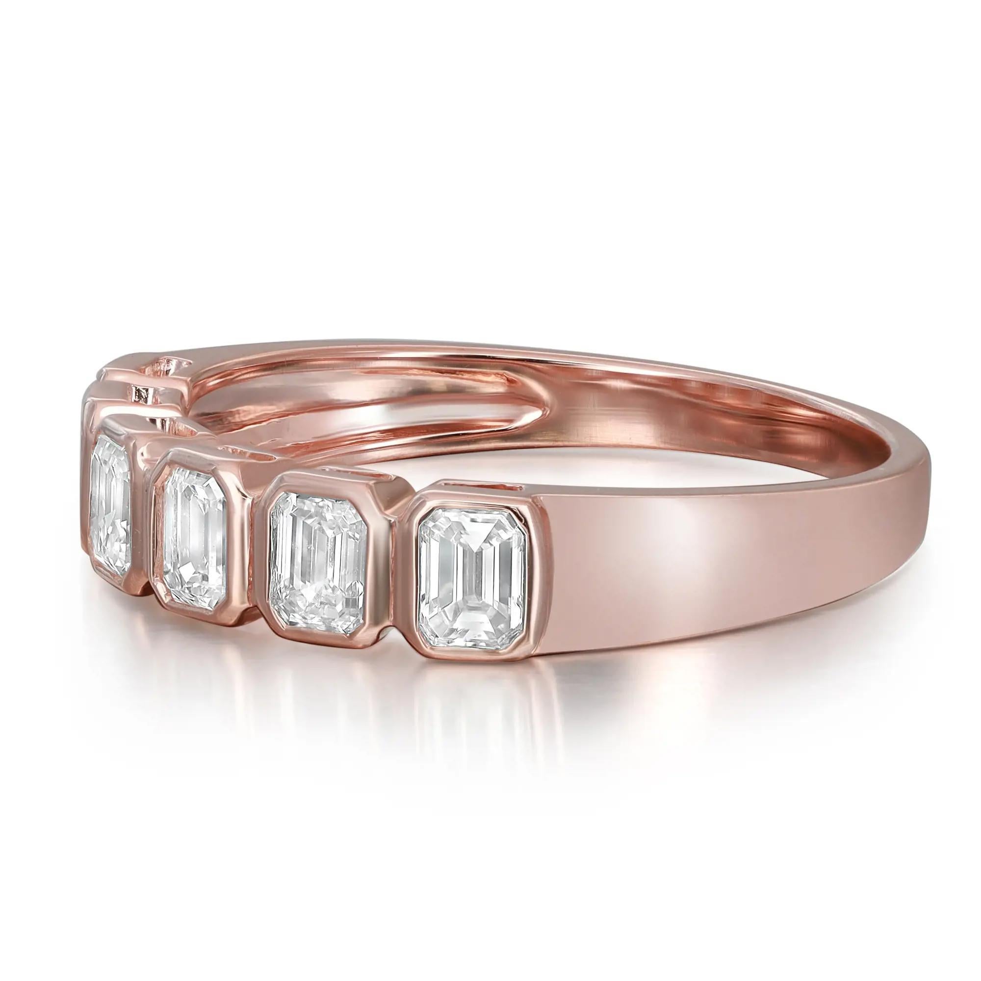 Celebrate everlasting love with this enchanting eternity band ring. Crafted in high polished 18K rose gold. Showcasing 6 bezel set emerald cut dazzling diamonds weighing 0.90 carat. Diamond quality: color G-H and clarity VS-SI. Ring size: 6.5.