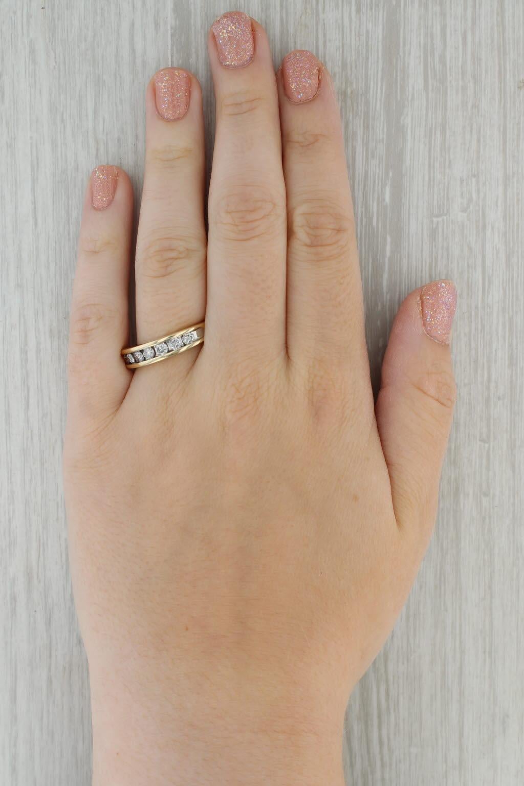 Gemstone Information:
- Natural Diamonds -
Total Carats - 0.90ctw
Cut - Round brilliant
Color - I-J
Clarity - I1-I2

Metal: 10k Yellow Gold
Weight: 7.7 Grams 
Stamps: 10k
Face Height: 5.6mm 
Rise Above Finger: 4.3mm
Band / Shank Width: 3mm

This