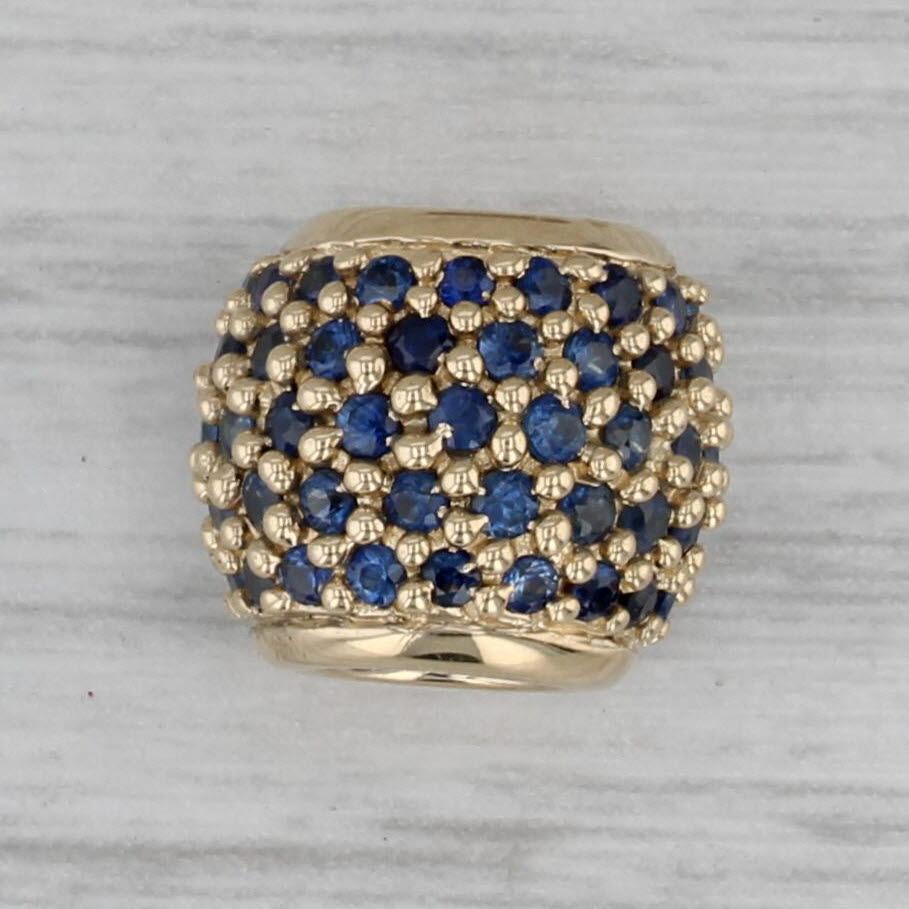 Gemstone Information:
- Natural Sapphires -
Total Carats - 0.90ctw
Cut - Round Brilliant
Color - Dark Blue
Treatment - Heated

Metal: 14k Yellow Gold
Weight: 3.2 Grams 
Stamps: 14k 
Measurements: 10.5 x 9.6 mm
Opening (front to back): 5.3 mm
