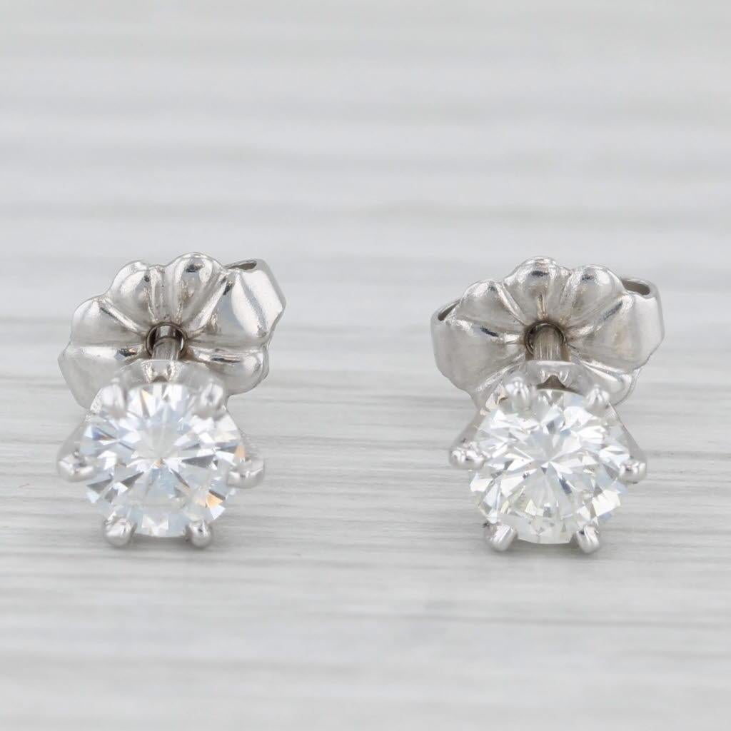 Gemstone Information:
- Natural Diamonds -
Total Carats - 0.90ctw
Cut - Round brilliant
Color - G-H
Clarity - SI1-SI2

Metal: 14k White gold 
Weight: 1.2 Grams 
Stamps: 14k 
Closure: Stick Posts & Butterfly Backs
Measurements:  5.3mm x 5.3mm
