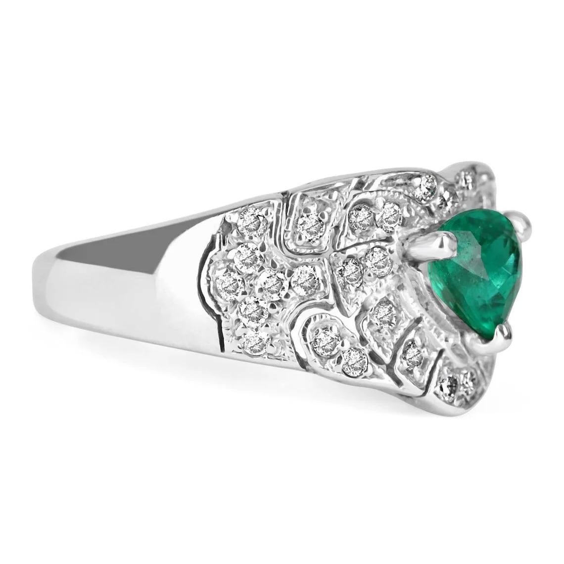 A one of a kind, emerald and diamond statement ring. The center stone features a stunning AAA+ quality trilliant cut Colombian emerald. Showcasing a vivacious, desirable green color with excellent luster. Surrounding this gorgeous stone there are