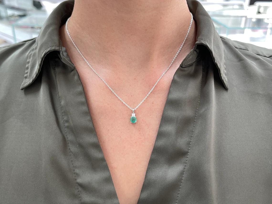 0.90tcw 14K Natural Emerald Round Cut Emerald & Diamond Accent Pendant For Sale 1