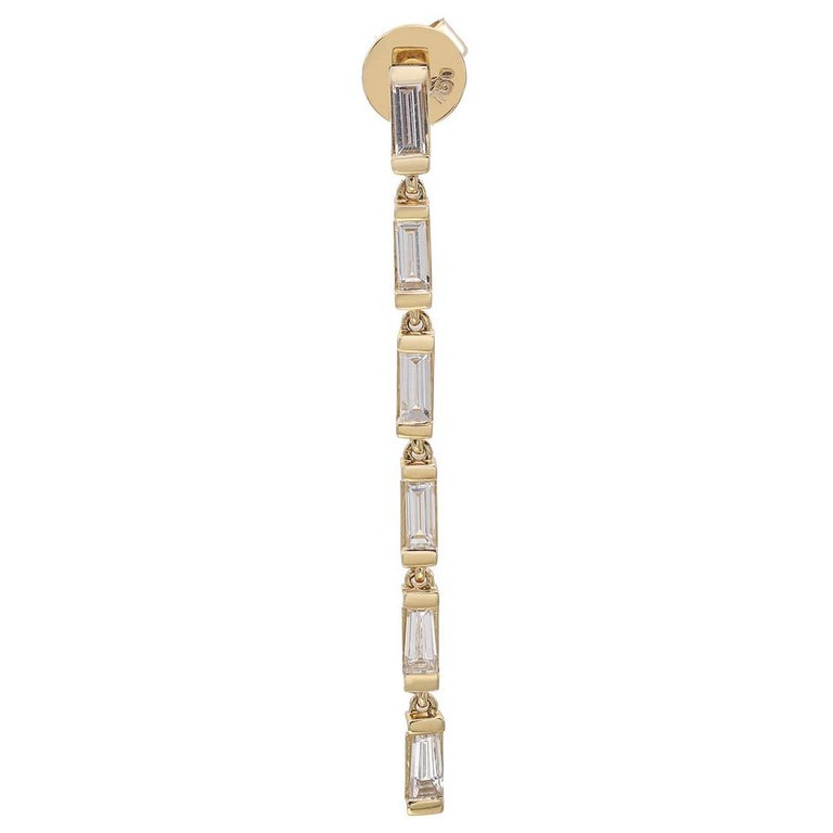 Enjoy subtle sparkle every day of the week with these modern drop earrings featuring vertical bars set with light-catching diamonds. Crafted in 18K Yellow Gold. Total diamond weight 0.91 Carat. 