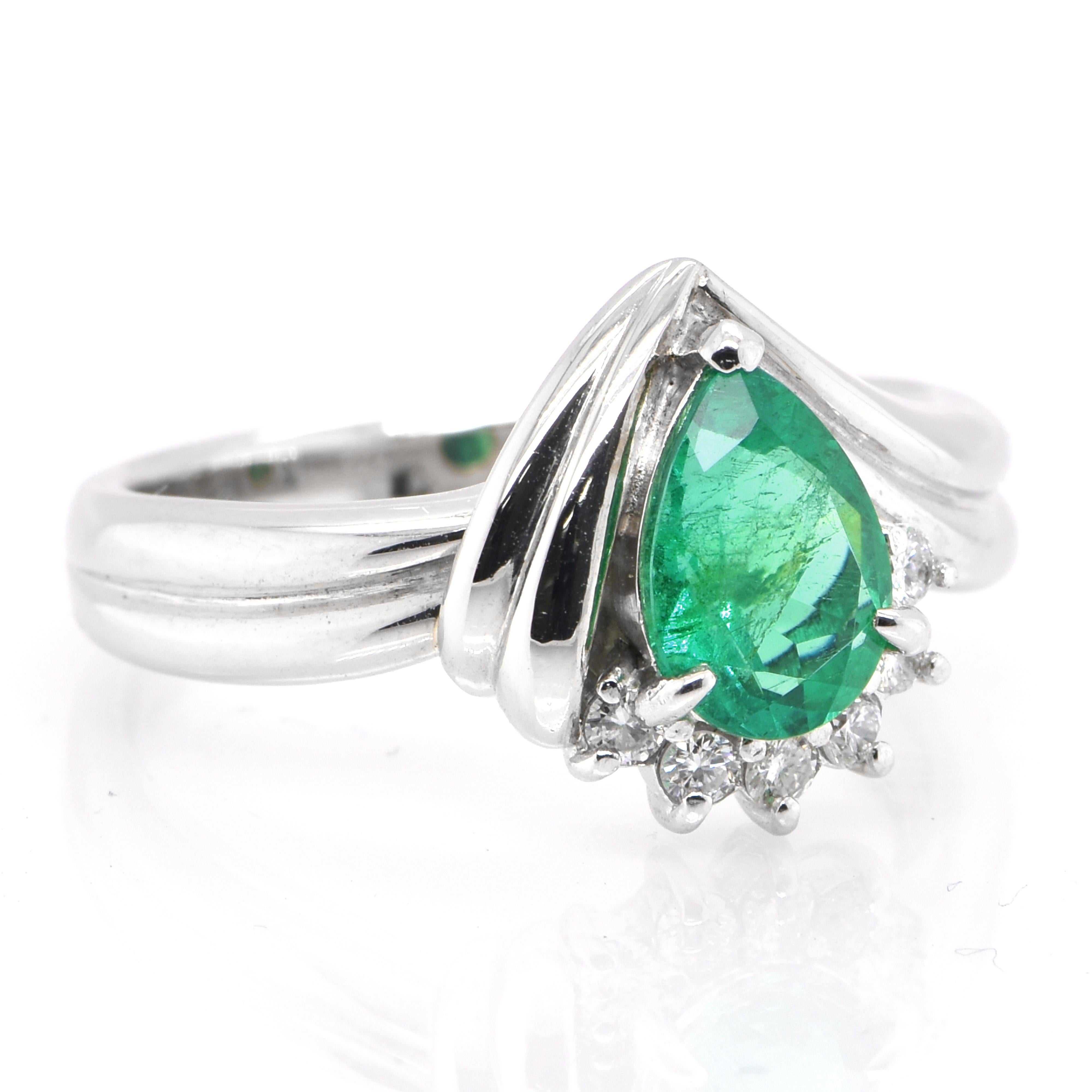 Modern 0.91 Carat Colombian, Pear-Cut Emerald and Diamond Ring Set in Platinum For Sale