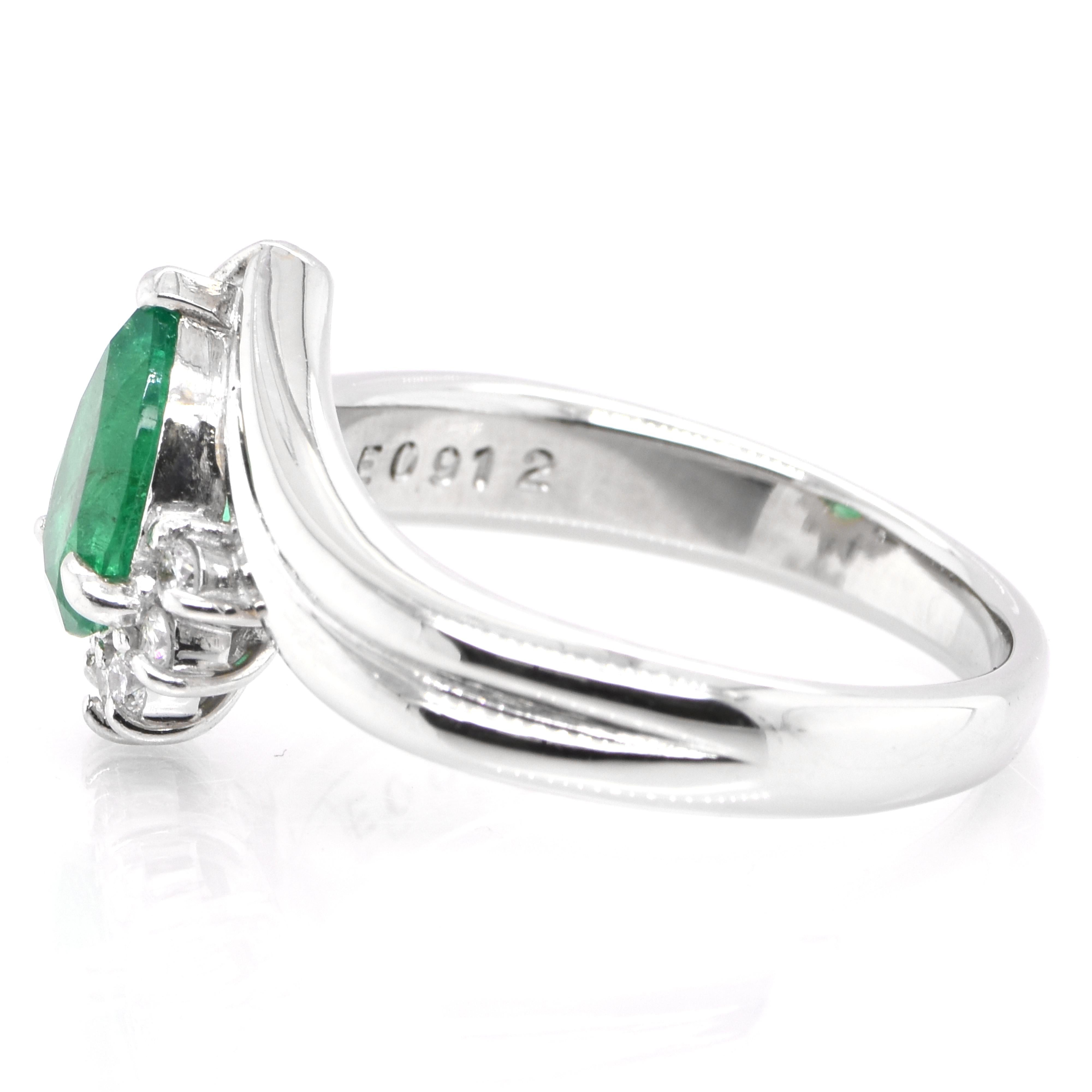 Pear Cut 0.91 Carat Colombian, Pear-Cut Emerald and Diamond Ring Set in Platinum For Sale