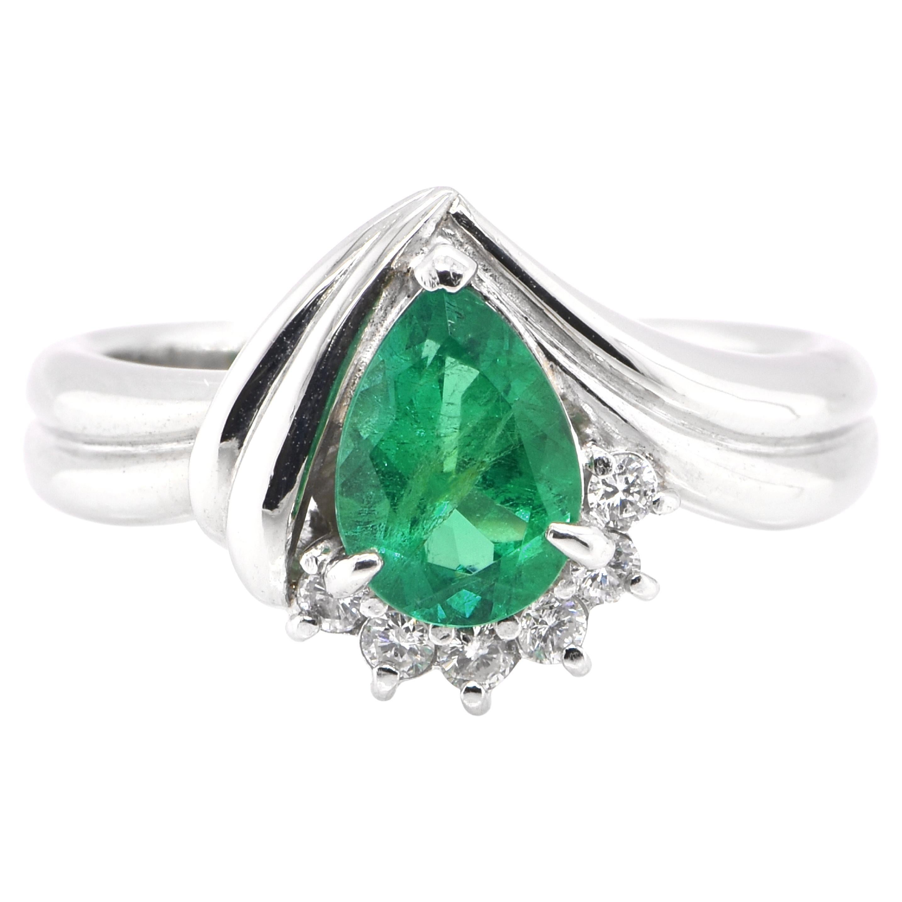 0.91 Carat Colombian, Pear-Cut Emerald and Diamond Ring Set in Platinum For Sale