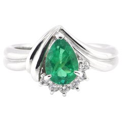 0.91 Carat Colombian, Pear-Cut Emerald and Diamond Ring Set in Platinum