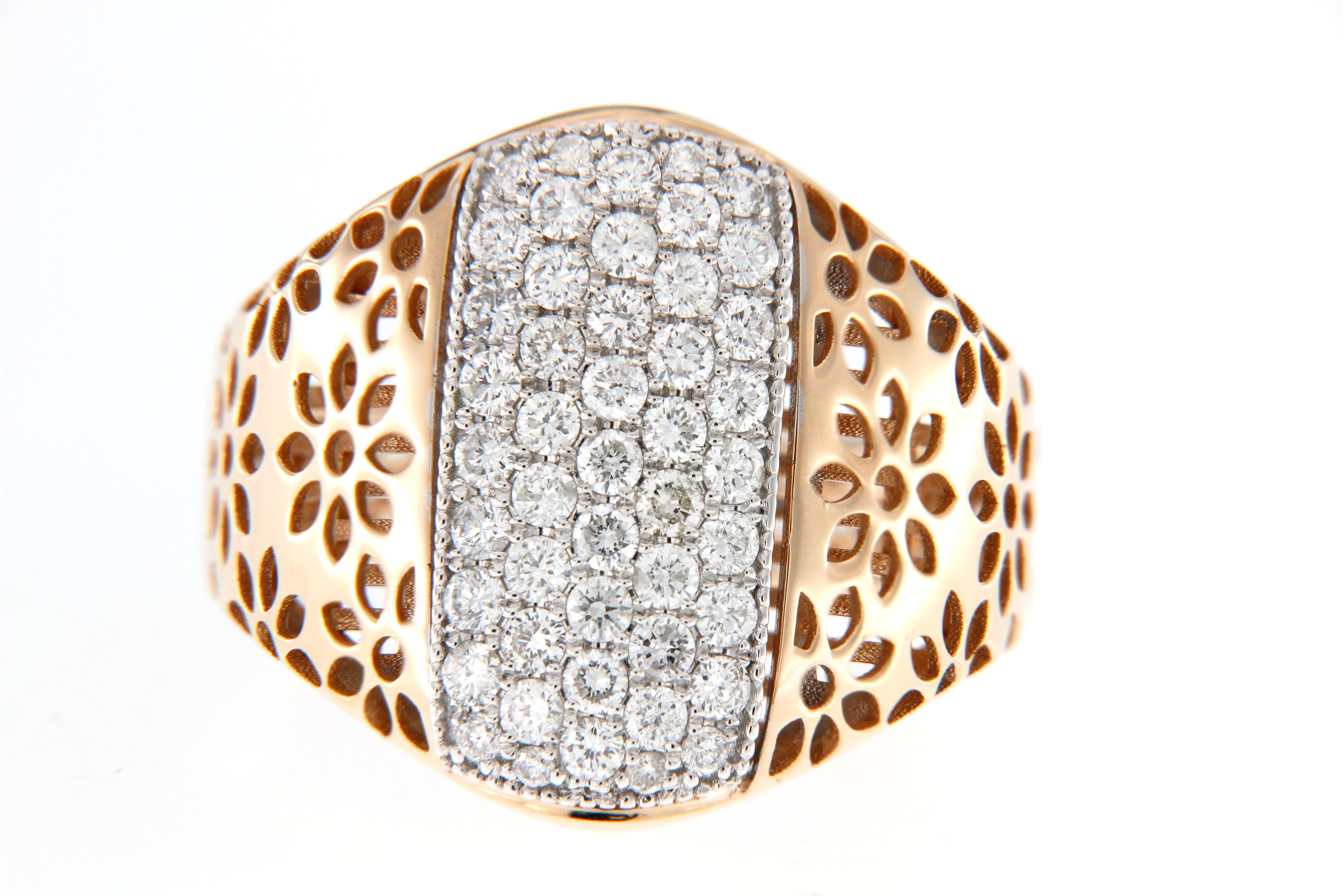 This unique rose gold diamond ring showcases a captivating pavé setting at its center, where rows of brilliant-cut diamonds are set closely together for a dazzling, high-impact shine. The surrounding floral-inspired cutout pattern adds a delicate,