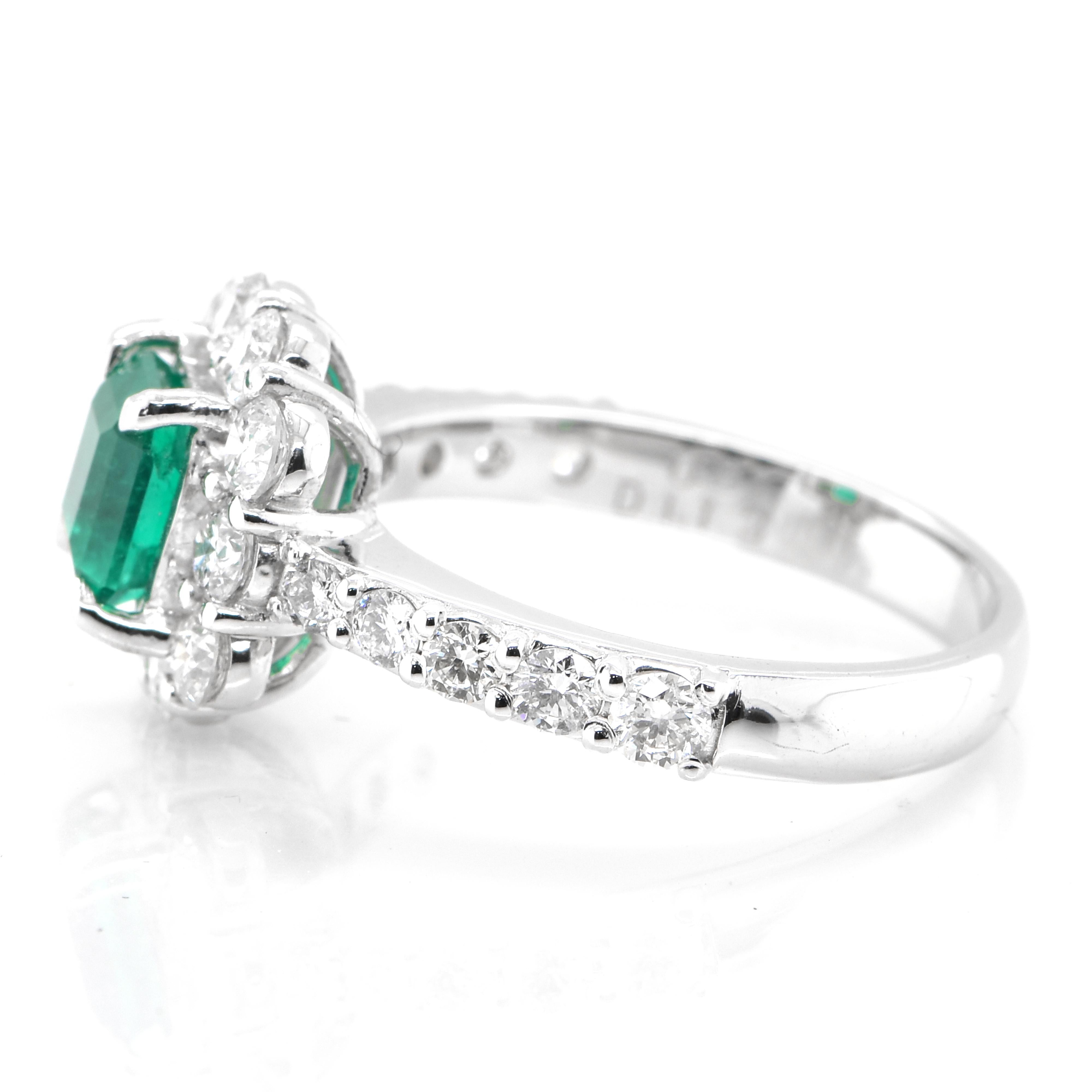 Emerald Cut 0.91 Carat Natural Colombian Emerald and Diamond Ring Made in Platinum For Sale