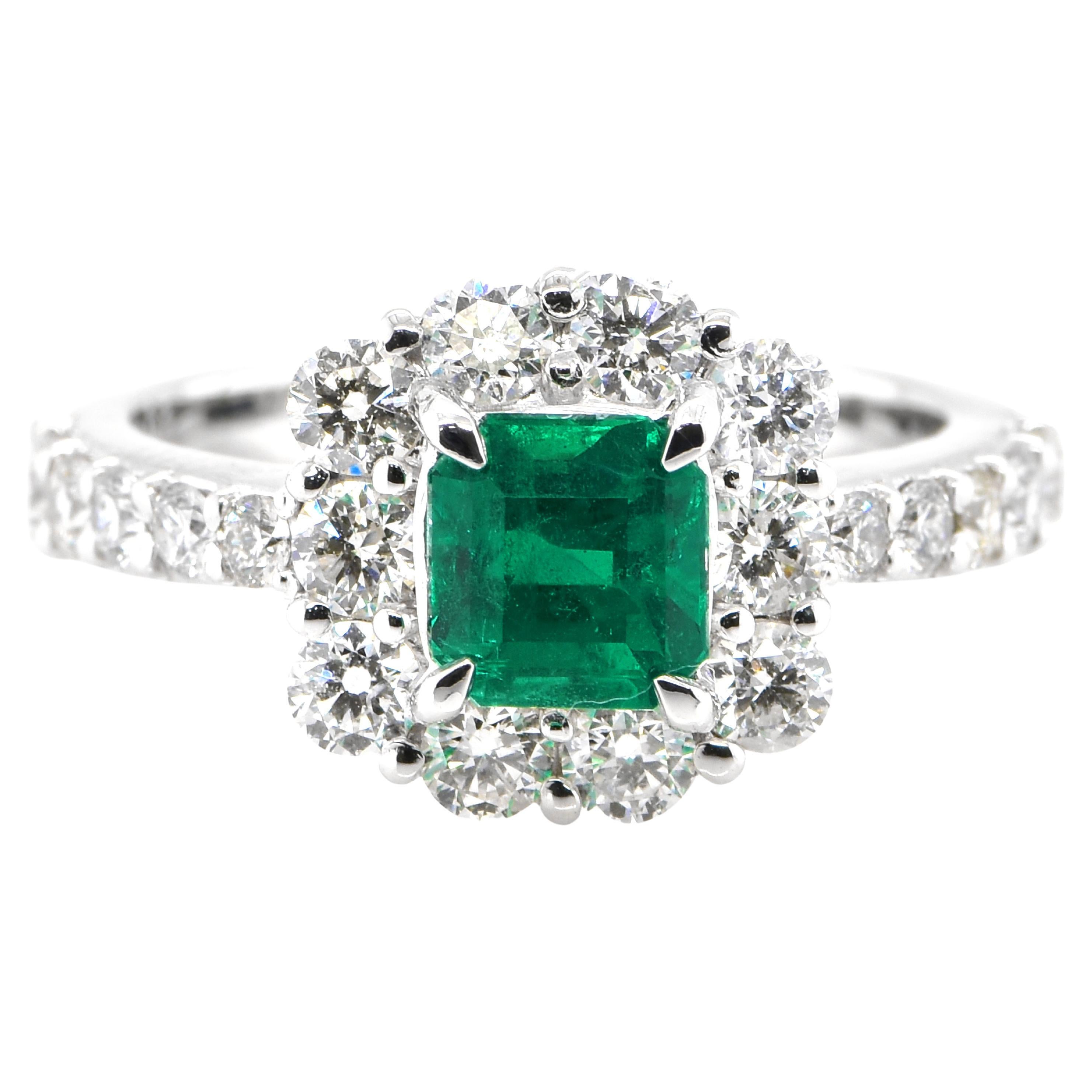 0.91 Carat Natural Colombian Emerald and Diamond Ring Made in Platinum For Sale