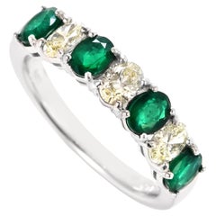 0.91 Carat Natural Emerald and Diamond Half Eternity Ring Made in Platinum