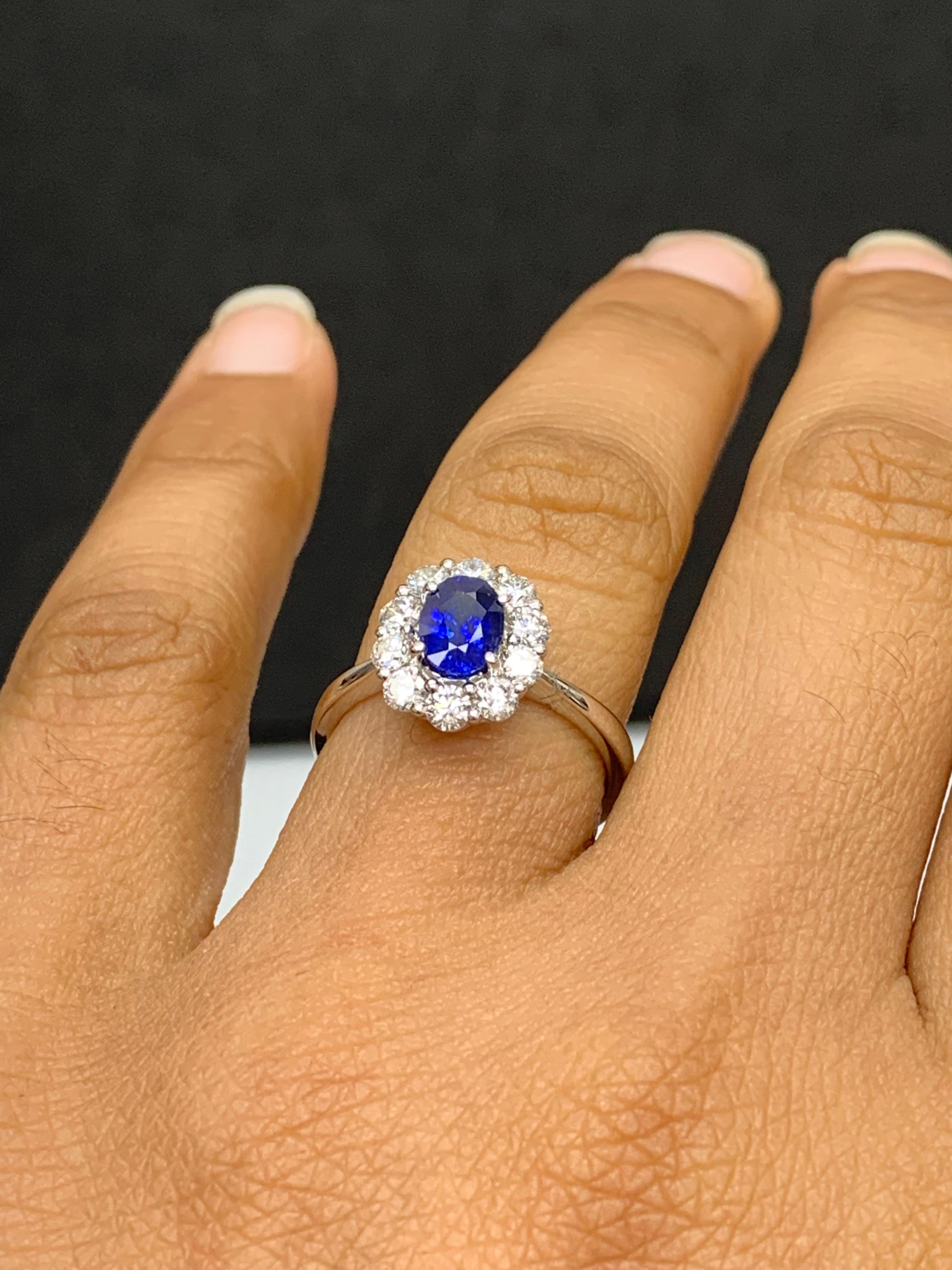 Modern 0.91 Carat Oval Cut Blue Sapphire and Diamond Ring in 18k White Gold For Sale