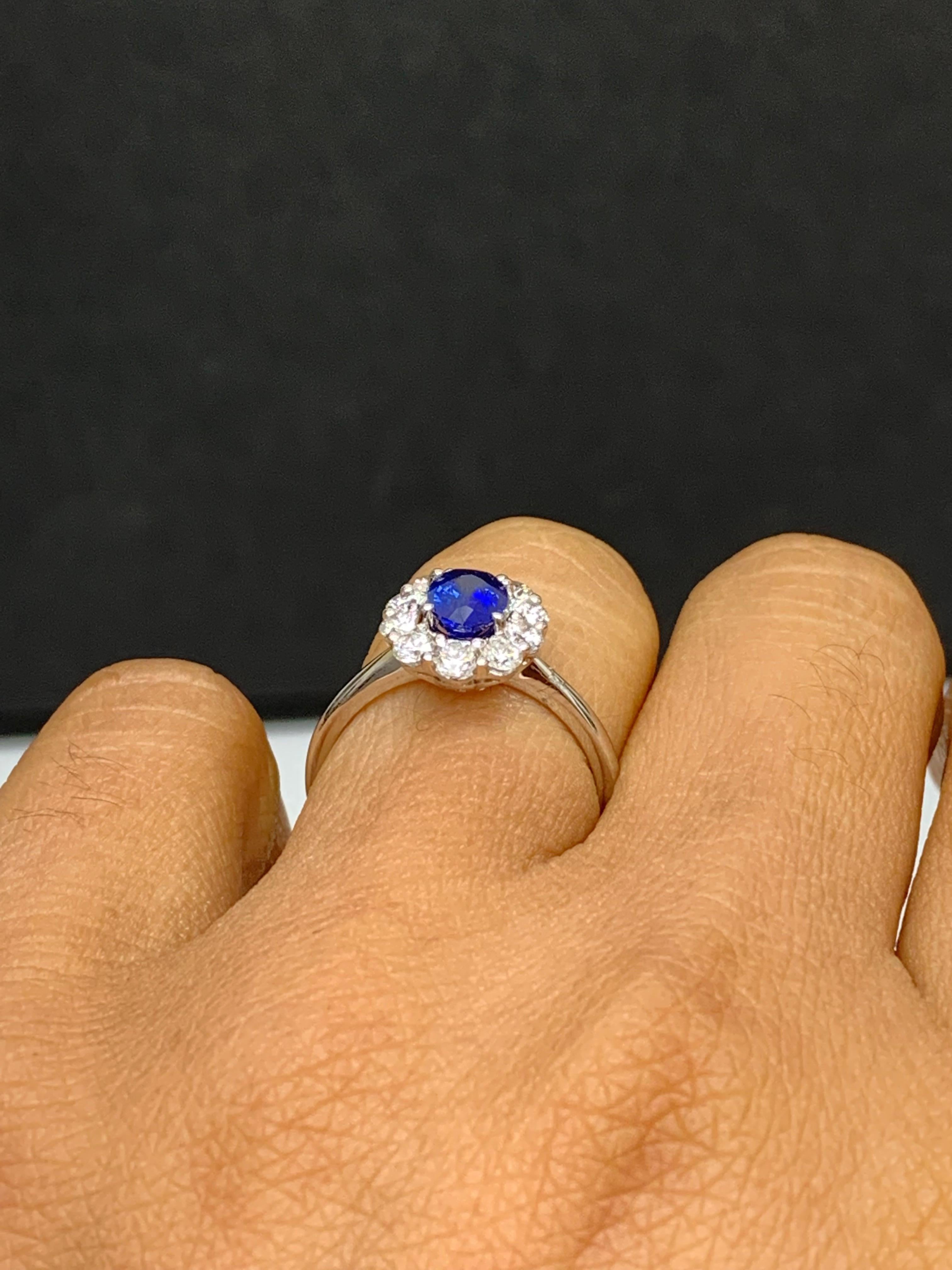 0.91 Carat Oval Cut Blue Sapphire and Diamond Ring in 18k White Gold In New Condition For Sale In NEW YORK, NY
