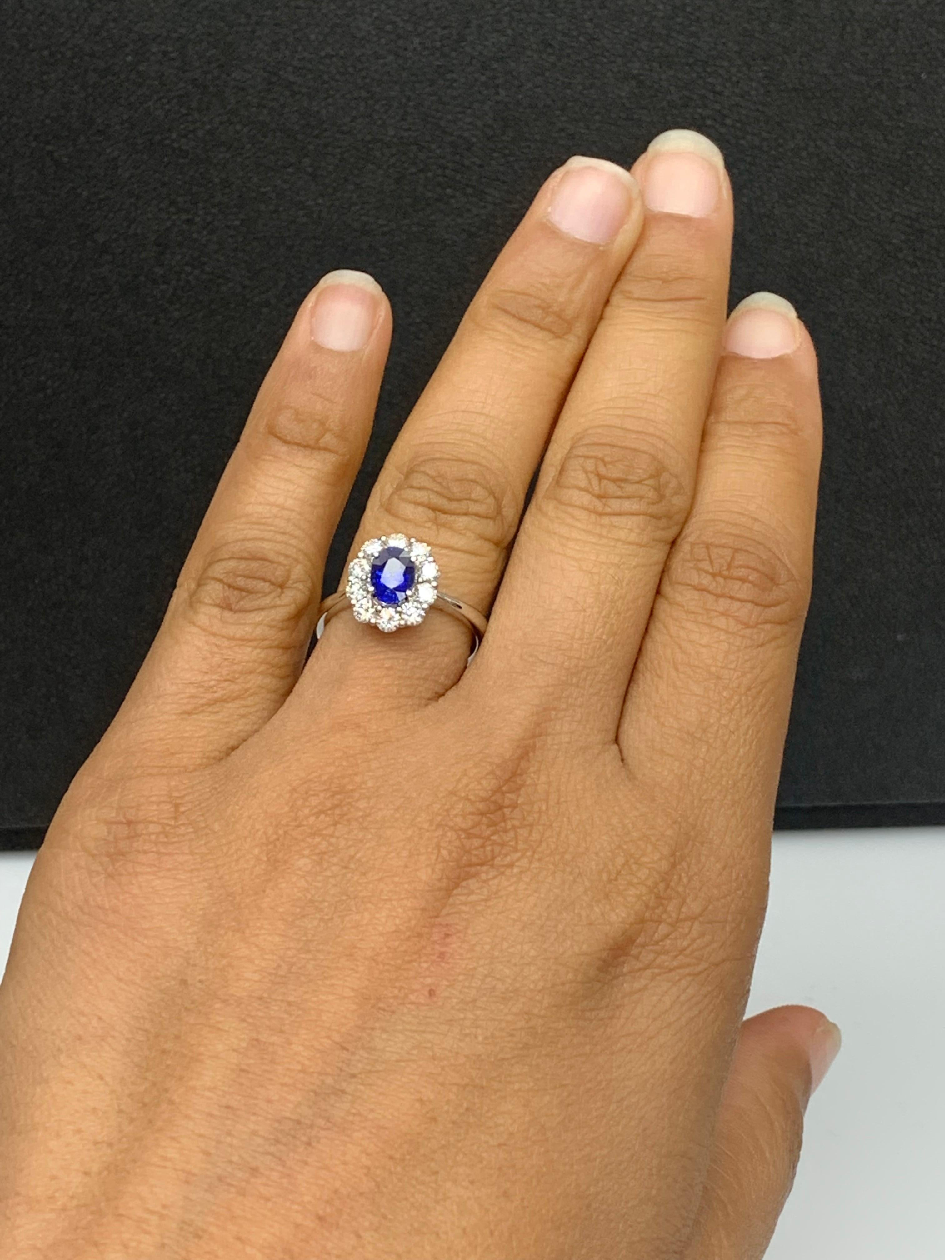 0.91 Carat Oval Cut Blue Sapphire and Diamond Ring in 18k White Gold For Sale 1