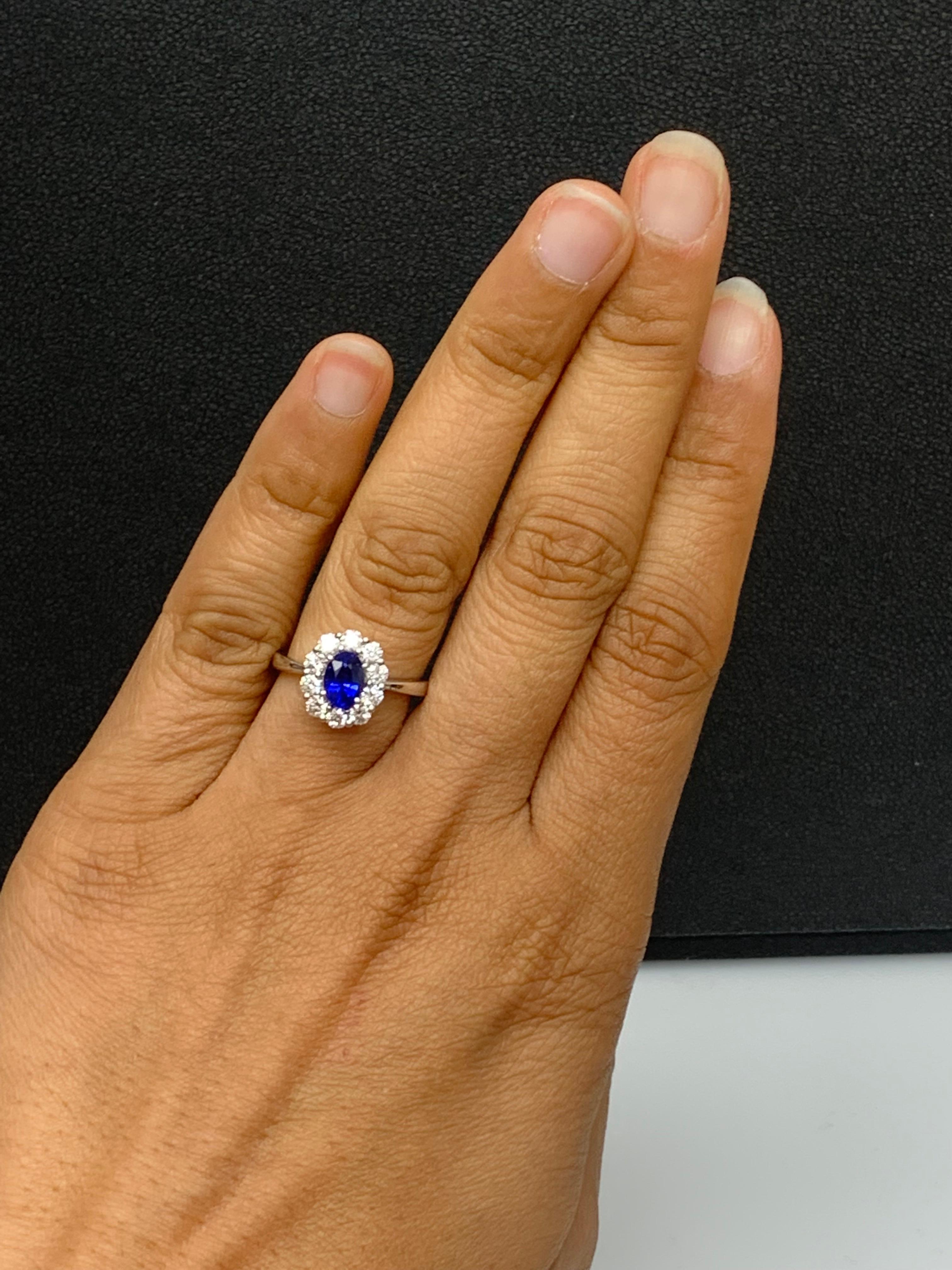 0.91 Carat Oval Cut Blue Sapphire and Diamond Ring in 18k White Gold For Sale 4