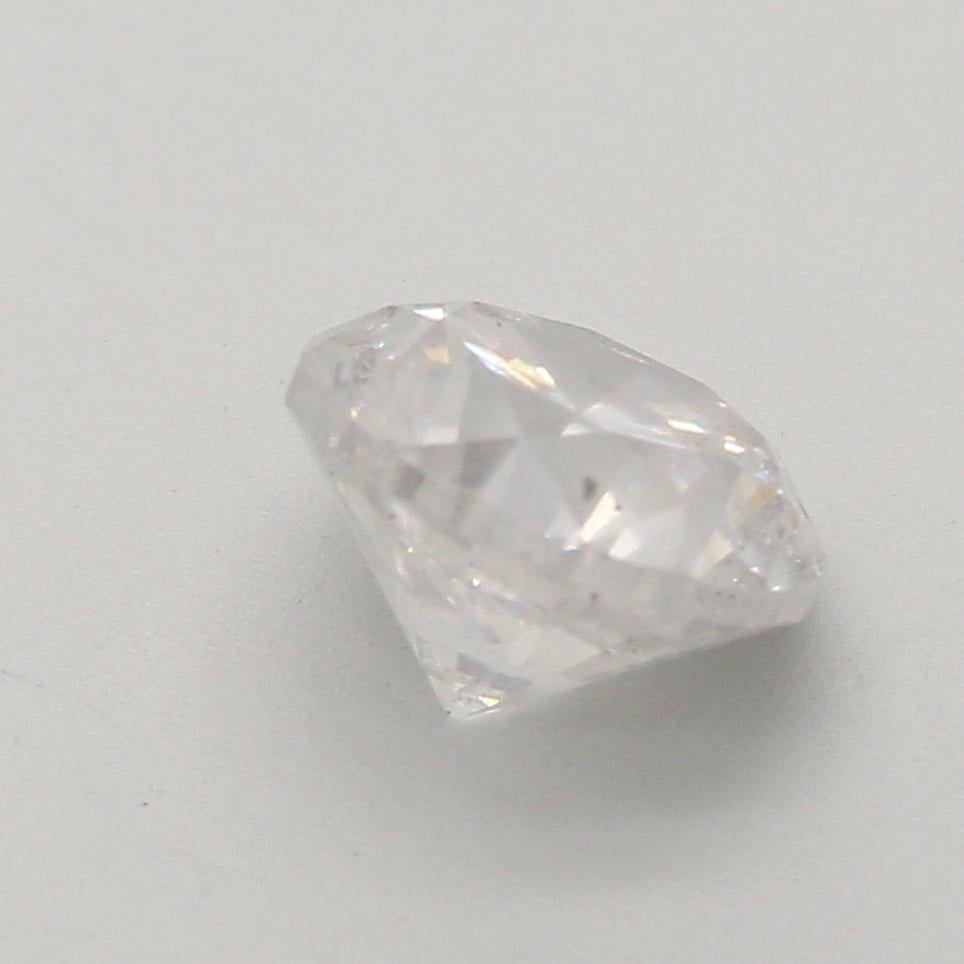 Diamant de forme ronde de 0,91 carat, pureté I2  en vente 2