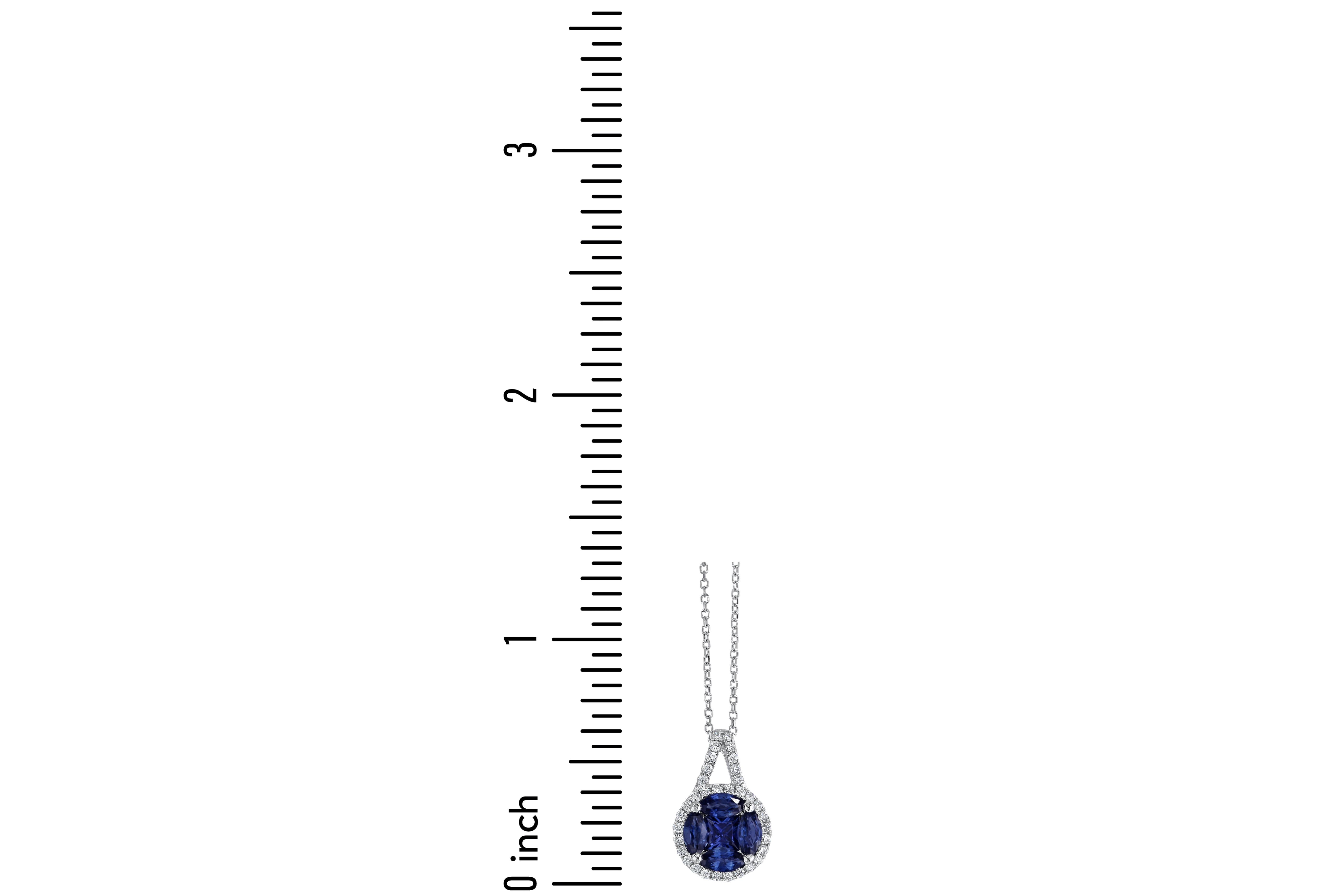 Laissez-vous séduire par l'allure captivante de notre pendentif exquis, où une magnifique grappe de saphirs bleus vifs vole la vedette. Cinq saphirs brillants (quatre marquises et une princesse carrée) ont un poids combiné de 0.97 carats.

Ce qui