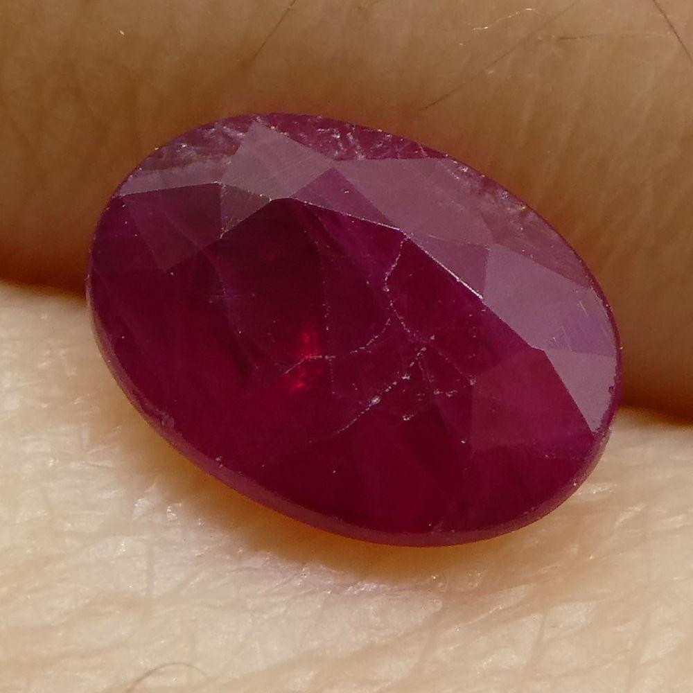 Description:

Gem Type: Ruby
Number of Stones: 1
Weight: 0.91 cts
Measurements: 6.88x4.97x2.68 mm
Shape: Oval
Cutting Style Crown: Modified Brilliant
Cutting Style Pavilion: Step Cut
Transparency: Translucent
Clarity: Moderately Included: Inclusions