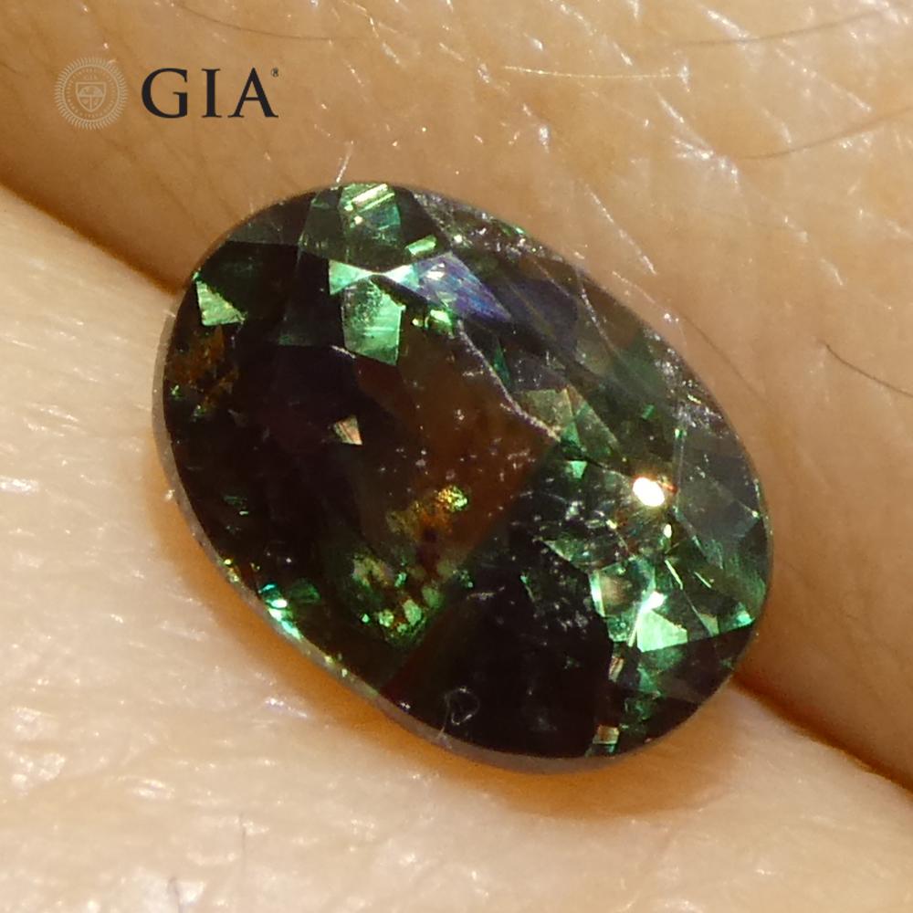 0,91 ct Alejandrita ovalada de color azul verdoso a púrpura rojizo certificada por la GIA de Madagascar Un en venta 9