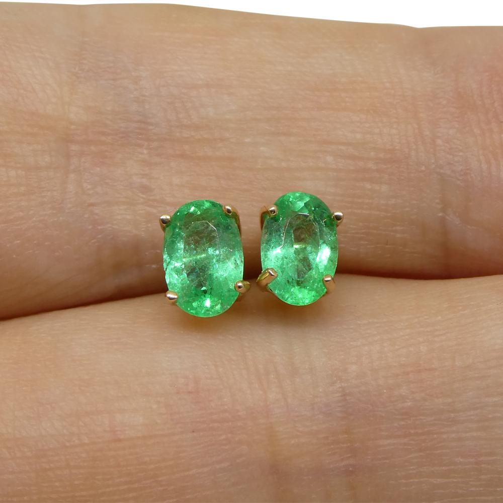 Description:

Stone Type: Emerald
Number of Stones: 2
Weight: 0.91 carats total weight
Measurements: 5.96 x 3.97 mm / 6.21 x 4.10 mm
Shape: Oval
Cutting Style: Crown: Brilliant Cut
Cutting Style: Pavilion: Modified Brilliant Cut
Transparency: