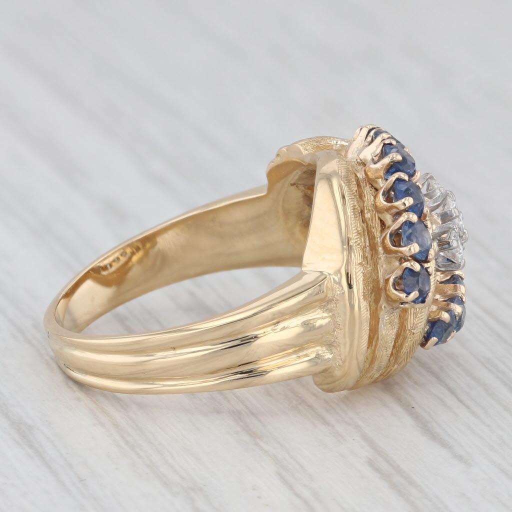 Gemstone Information:
- Natural Diamonds -
Total Carats - 0.13ctw
Cut - Round Brilliant
Color - F - G
Clarity - VS2

- Natural Sapphires -
Total Carats - 0.78ctw
Cut - Round Brilliant
Color - Dark Blue
Treatment - Heated

Metal: 18k Yellow Gold