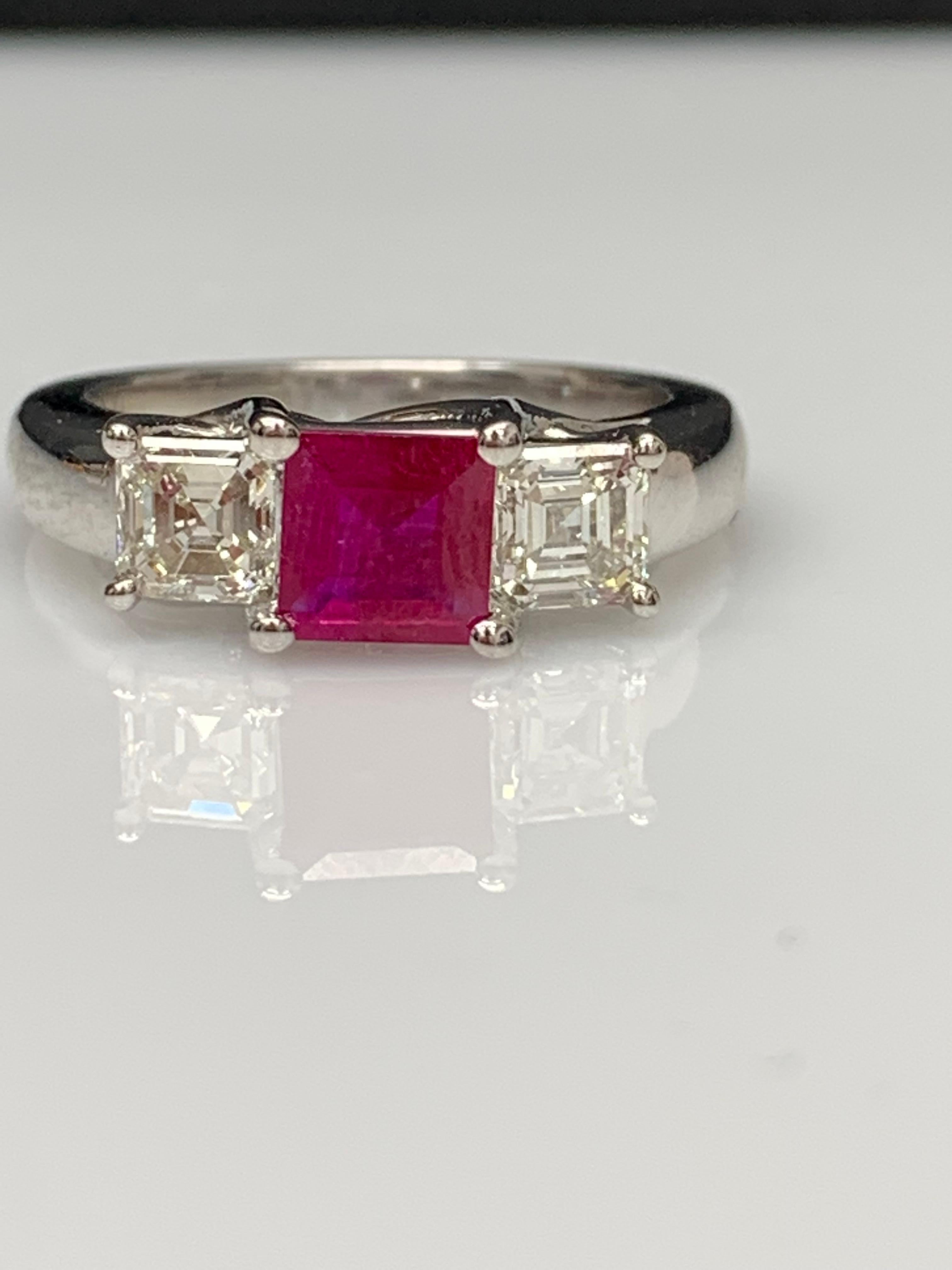 Modern 0.92 Carat Emerald Cut Ruby and Diamond Three-Stone Engagement Ring in 14K For Sale