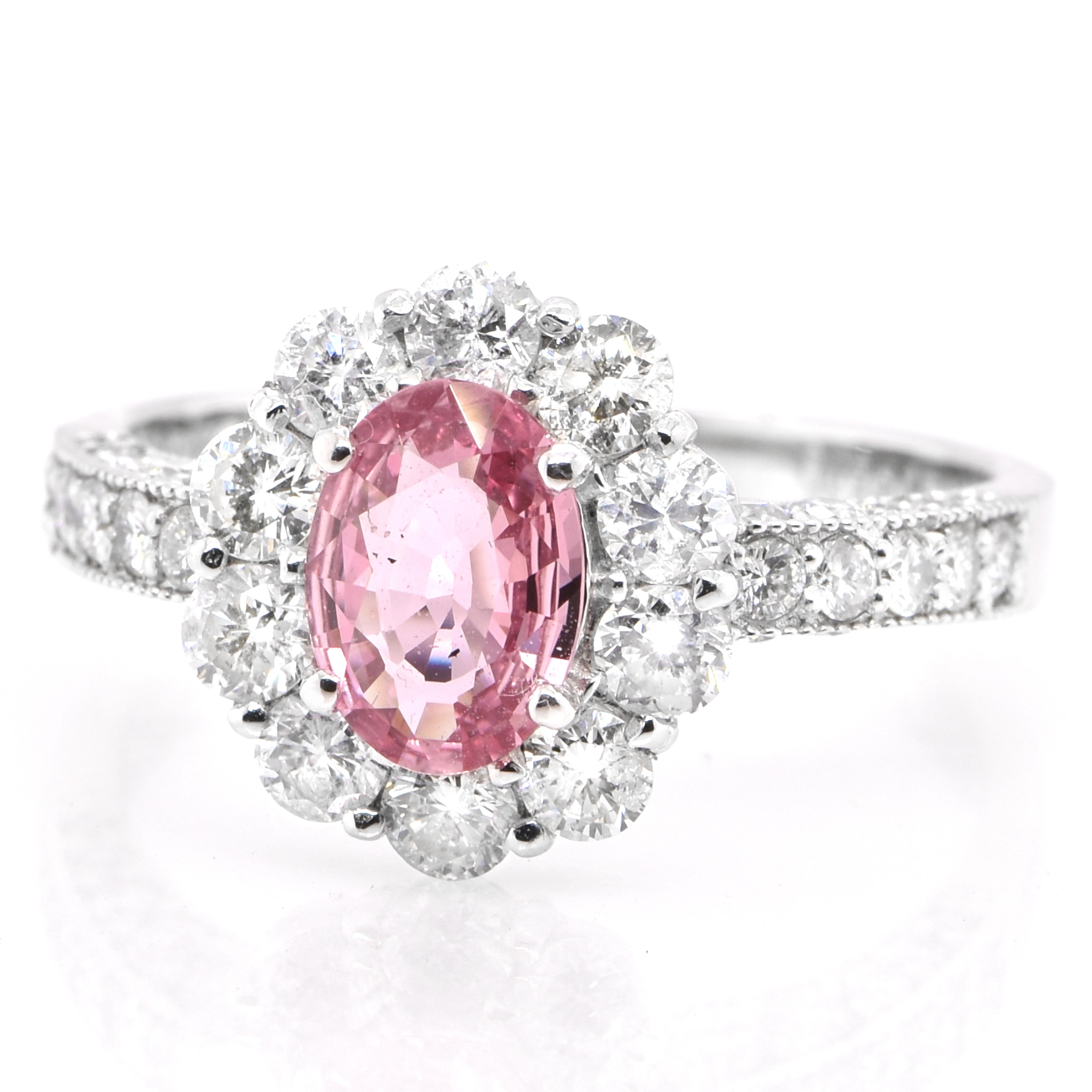 A beautiful ring featuring 0.92 Carat Natural Padparadscha Sapphire and 1.31 Carats of Diamond Accents set in Platinum. Sapphires have extraordinary durability - they excel in hardness as well as toughness and durability making them very popular in