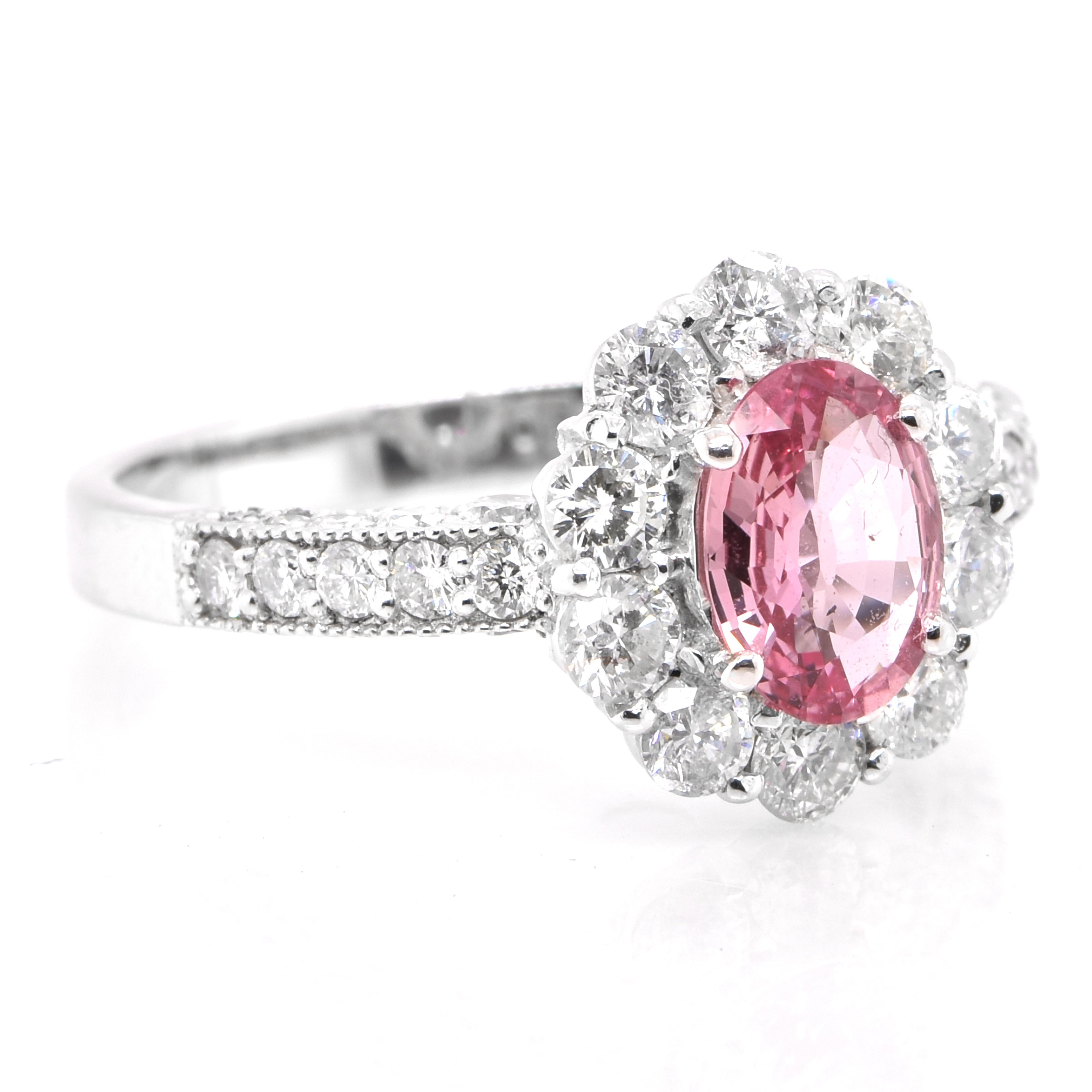 Modern 0.92 Carat Natural Padparadscha Sapphire and Diamond Ring Set in Platinum For Sale