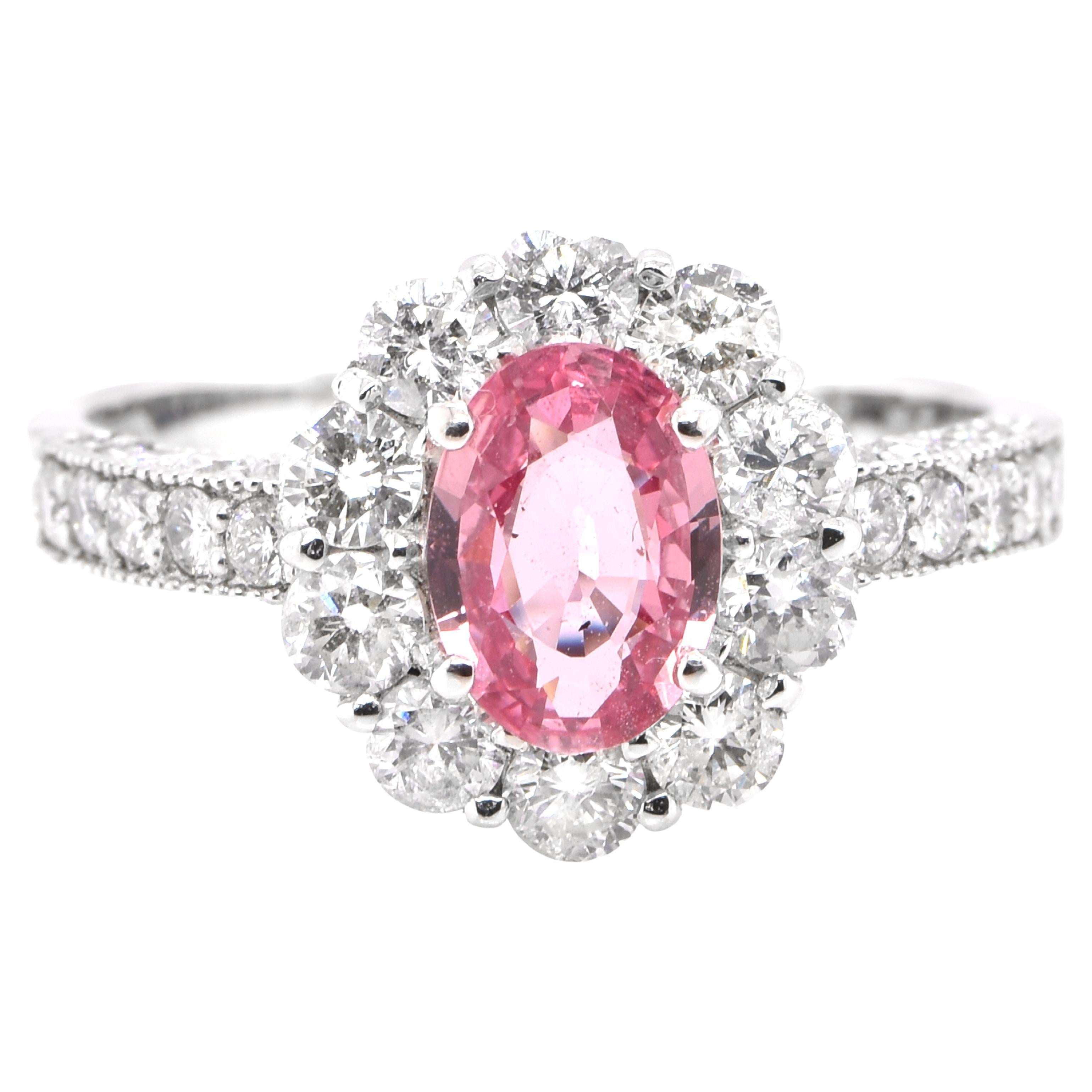 0.92 Carat Natural Padparadscha Sapphire and Diamond Ring Set in Platinum For Sale