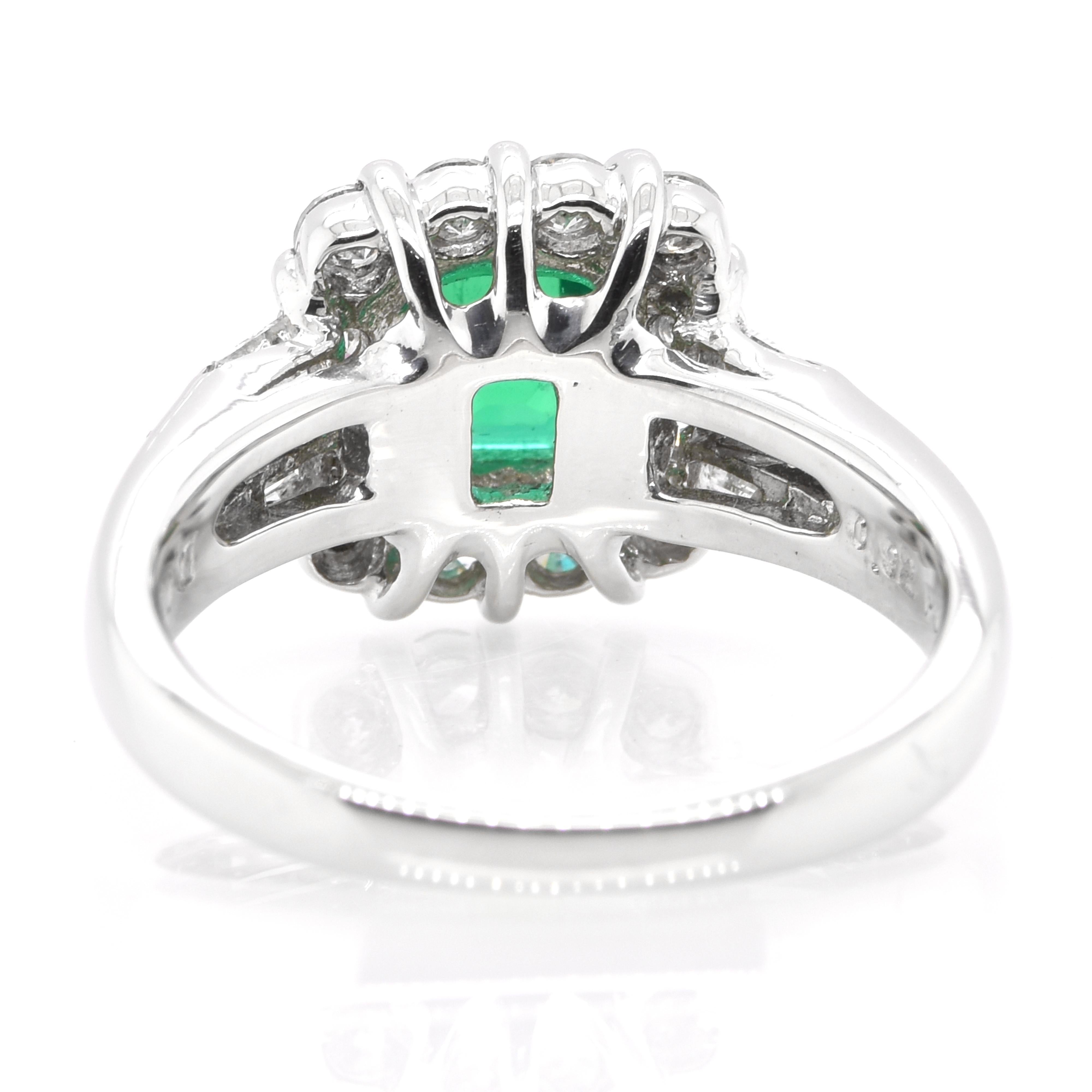 A stunning ring featuring a 0.92 Carat Natural Emerald and 0.65 Carats of Diamond Accents set in Platinum. People have admired emerald’s green for thousands of years. Emeralds have always been associated with the lushest landscapes and the richest