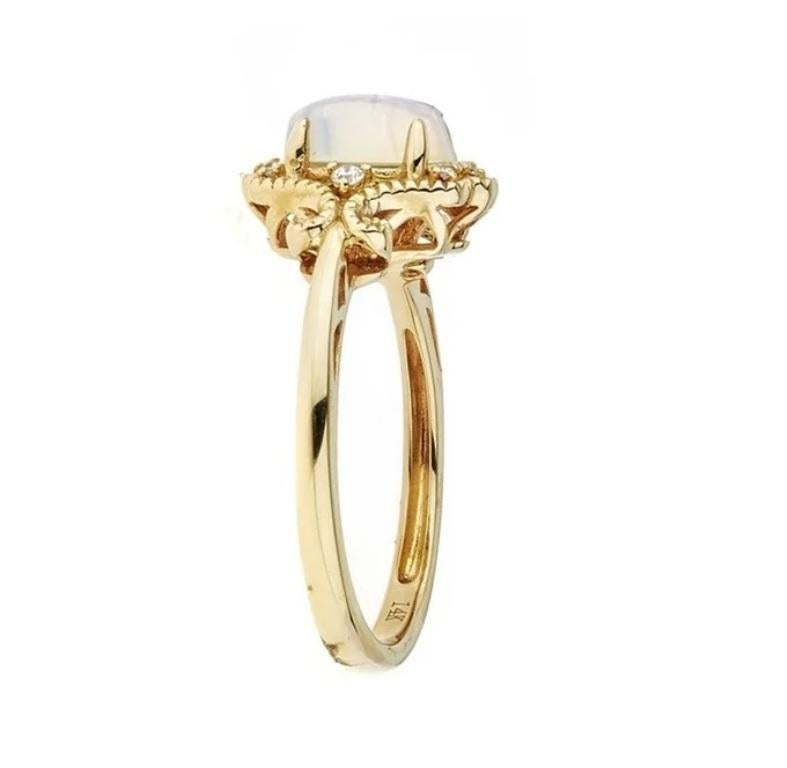 Schmücken Sie sich mit Eleganz mit diesem Ring aus 10-karätigem Gelbgold von Gin & Grace Ring. Dieser Ring besteht aus einem 8x6 mm großen äthiopischen Opal mit Ovalschliff (1 Stück) 0,92 Karat und einem weißen Diamanten mit Rundschliff (8 Stück)