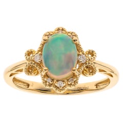 0.92 Carat Oval-Cab Ethiopian Opal Diamond Accents 14K Yellow Gold Ring