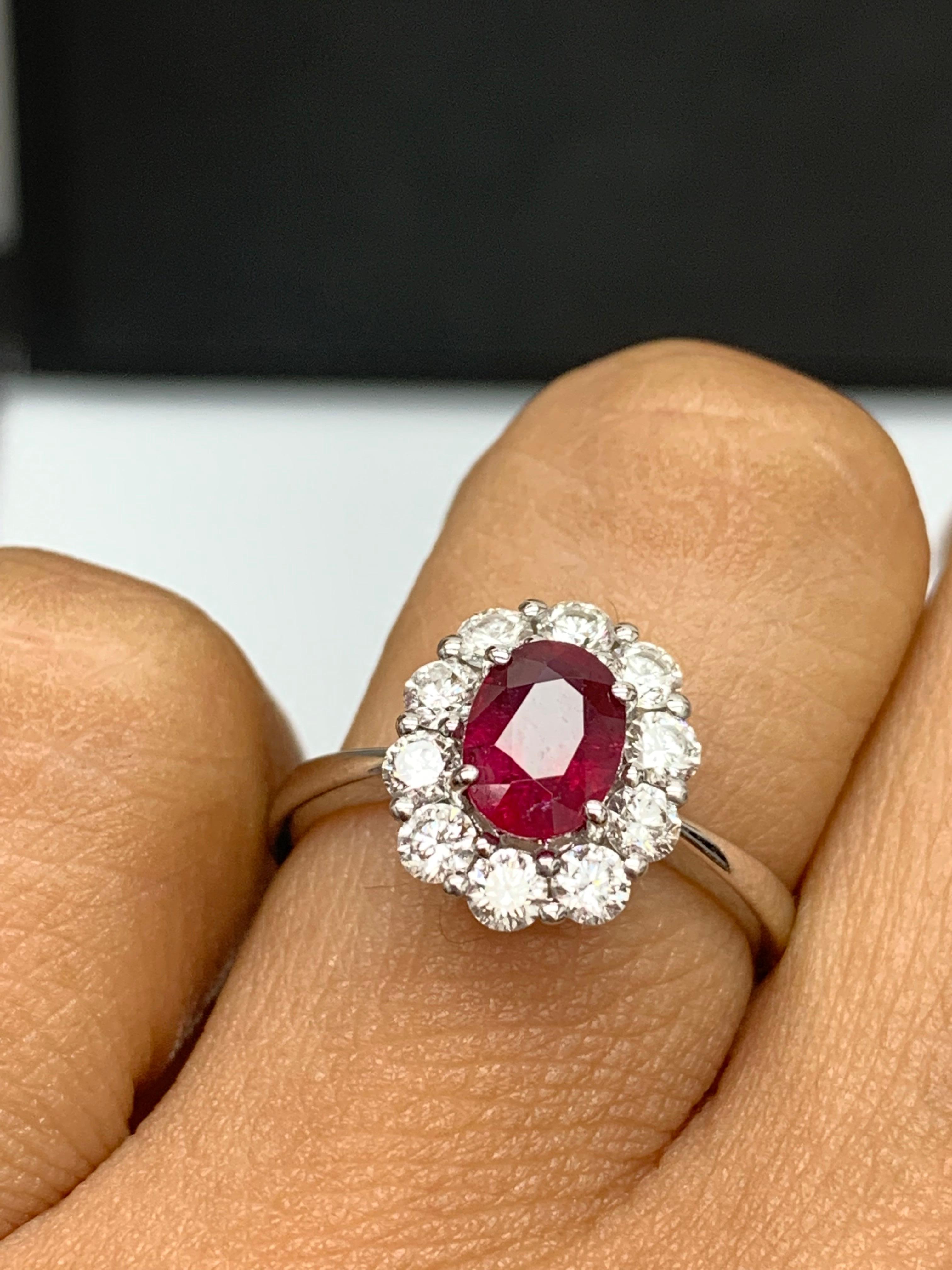 Modern 0.92 Carat Oval Cut Ruby and Diamond Ring in 18k White Gold For Sale