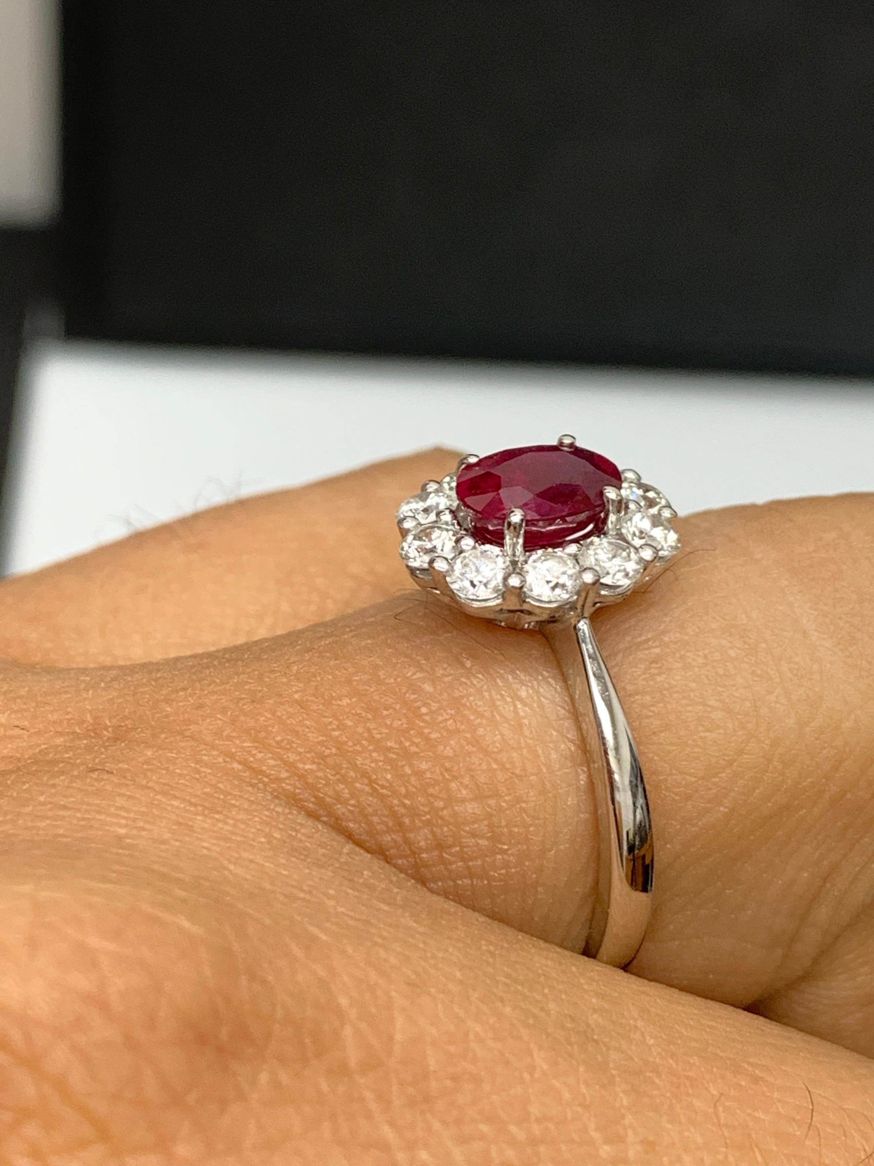 Women's 0.92 Carat Oval Cut Ruby and Diamond Ring in 18k White Gold For Sale