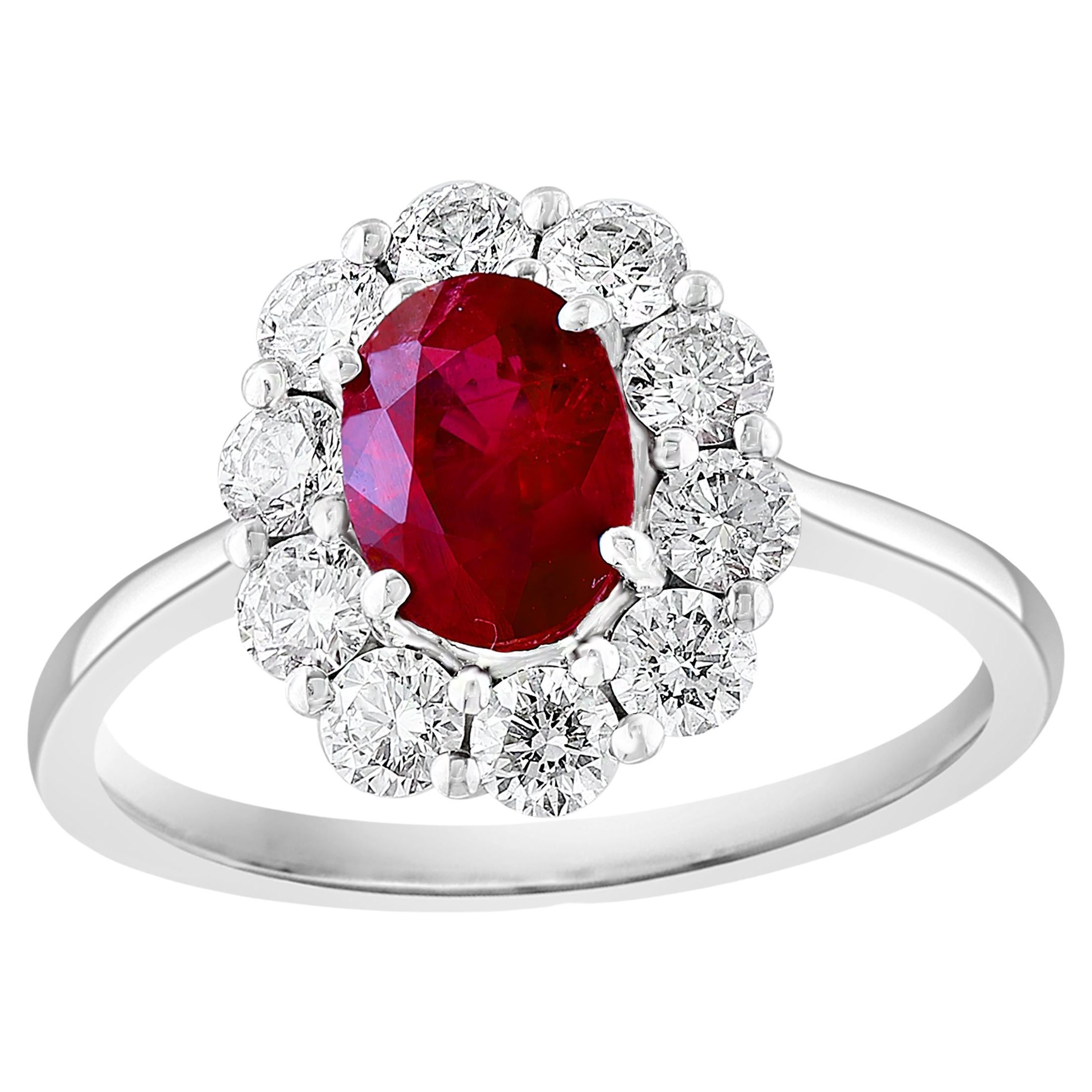 0.92 Carat Oval Cut Ruby and Diamond Ring in 18k White Gold For Sale