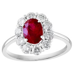 0.92 Carat Oval Cut Ruby and Diamond Ring in 18k White Gold