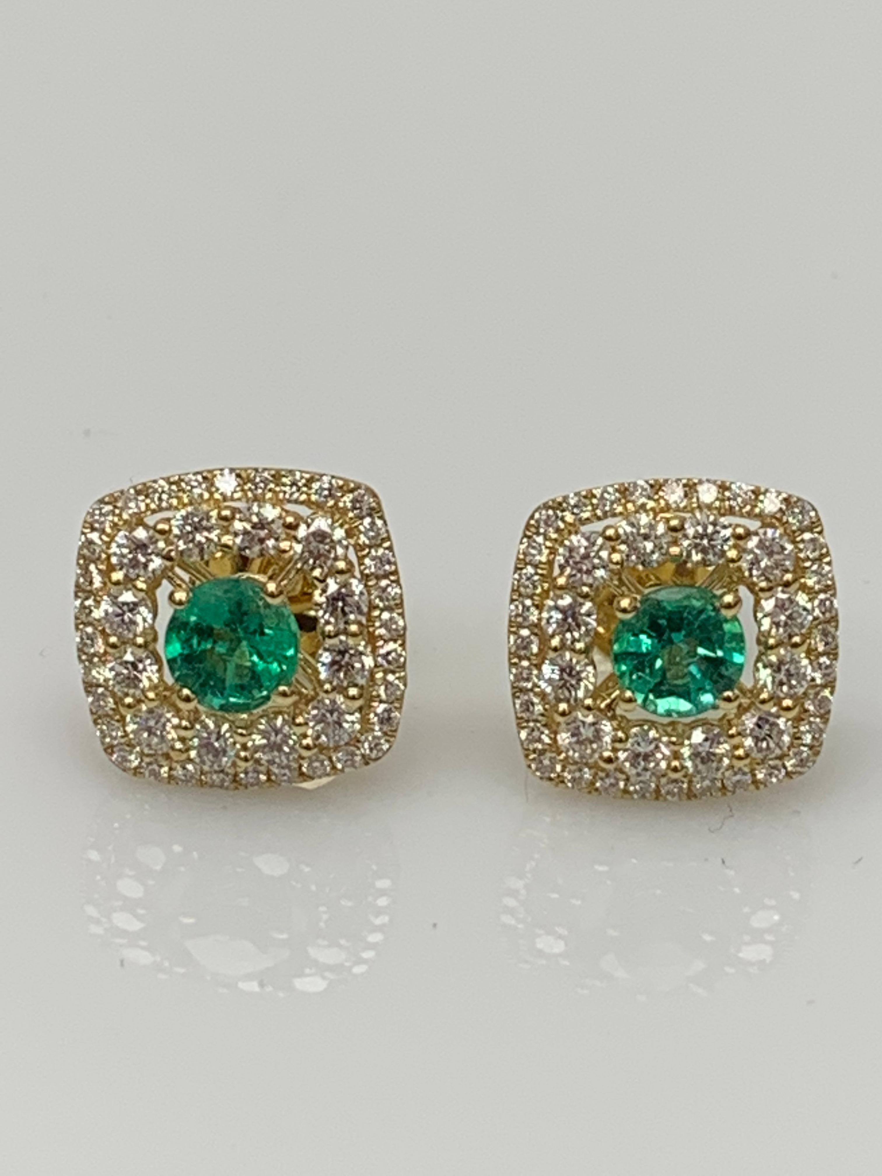 A simple pair of stud earrings showcasing 0.92 carats of round shape 2 emeralds, surrounded by a double row of 88 brilliant round diamonds weighing 1.12 carats and made in 18-karat yellow gold.
