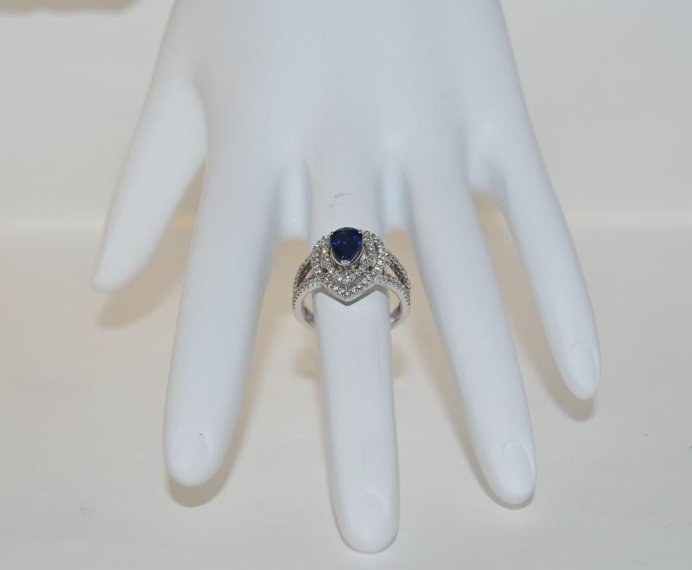 Pear Cut 0.92 Carat Sapphire and Diamond Ring in 14 Karat Gold For Sale