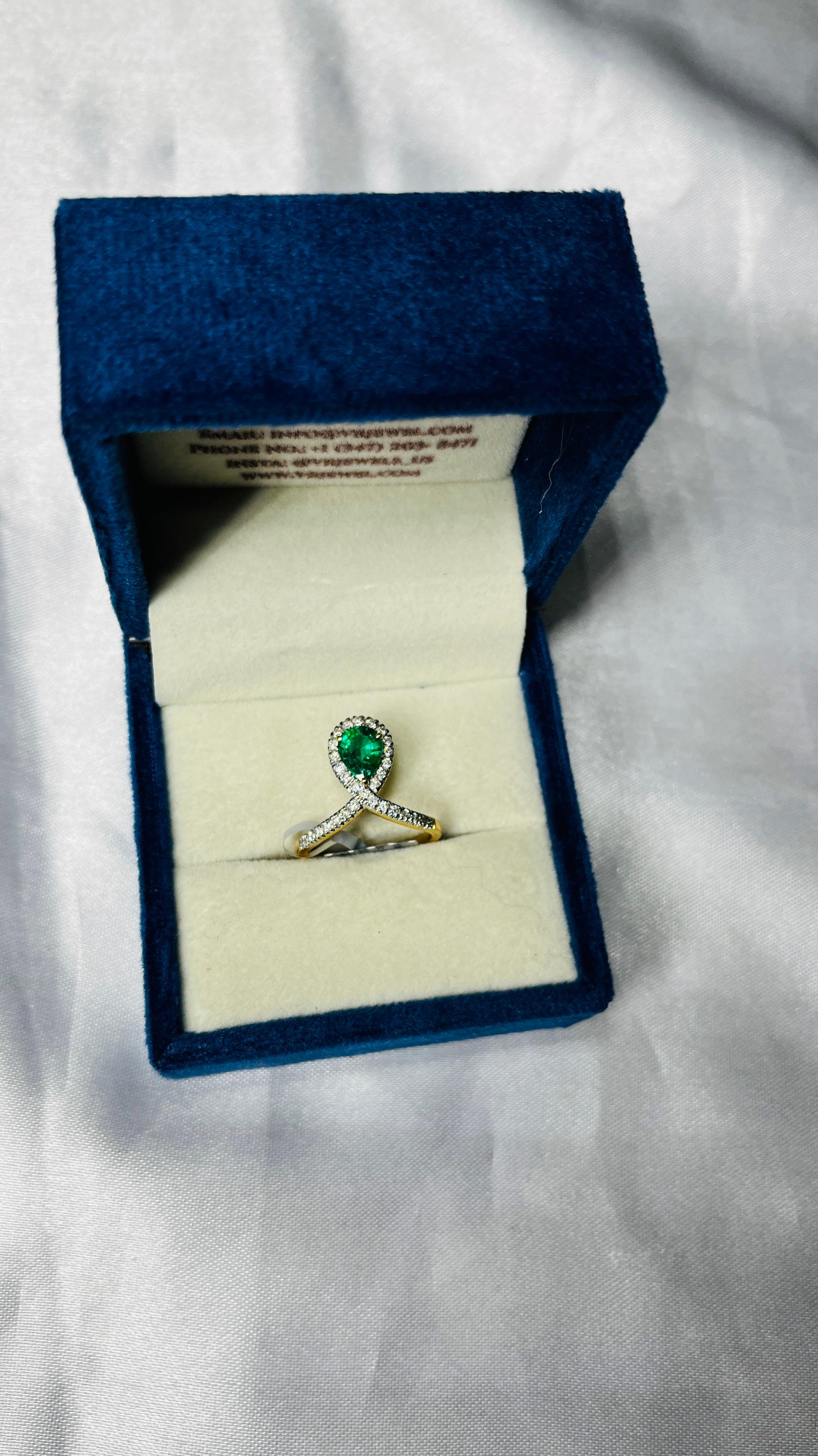 For Sale:  0.92 ct Brilliant Pear Cut Emerald and Diamond Loop Ring in 18K Yellow Gold 7
