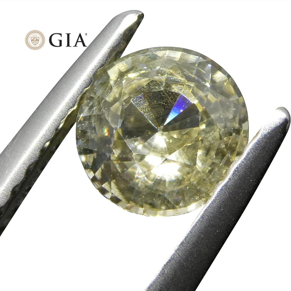 0.92 ct Round Pastel Yellow Sapphire GIA Certified Sri Lankan Unheated In New Condition For Sale In Toronto, Ontario