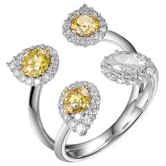 0.92ct Fancy Color Diamond Ring in 18kt Gold and 0.33ct Oval White Diamond