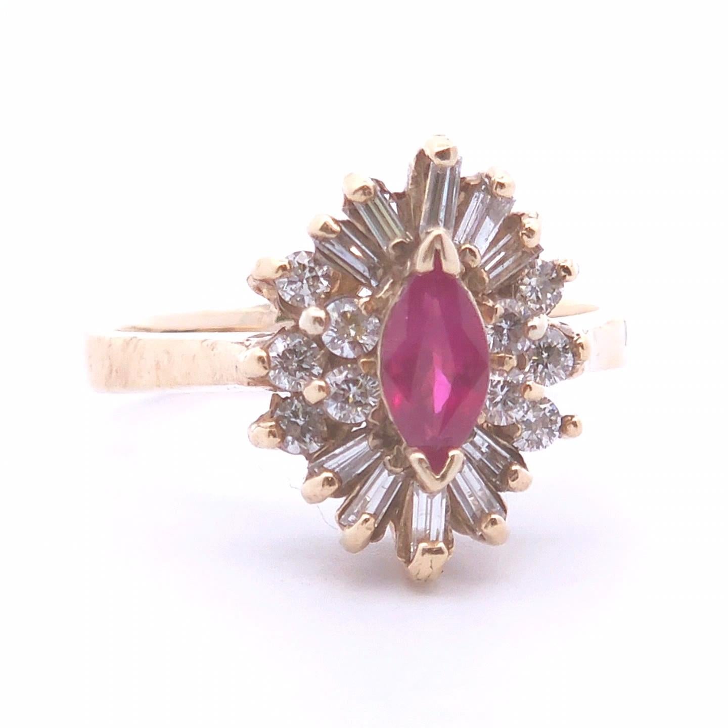 Introducing our exquisite 0.92ct Marquise Ruby Diamond Ring, a true embodiment of elegance and sophistication. 

This ring comes in a size 6.25

Crafted in luxurious 14k Yellow Gold, this stunning piece features a captivating 0.46ct ruby center