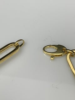 Bracciale fermacarte con diamanti da 0,93 carati in oro giallo e oro bianco 14 carati