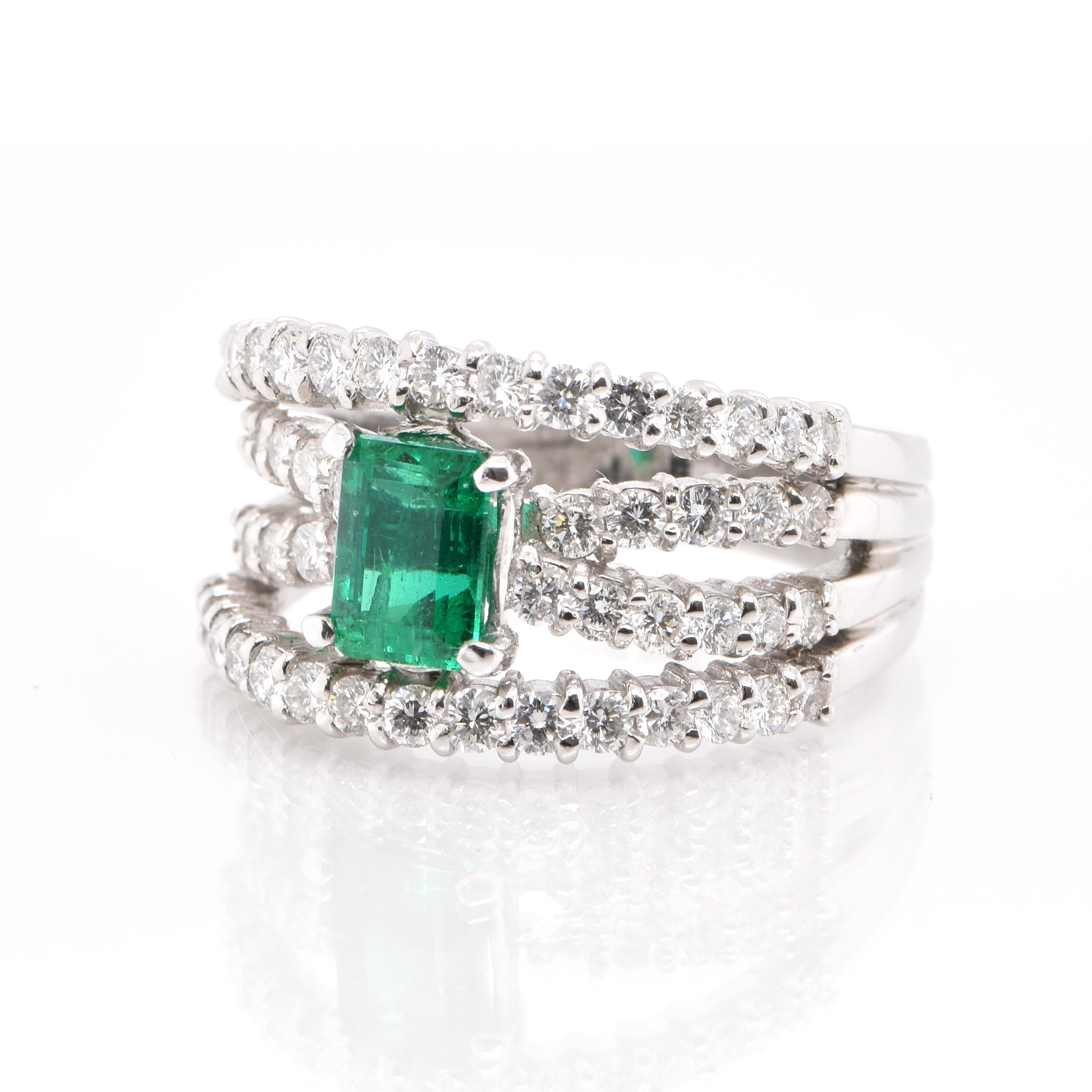 A stunning Ring featuring a 0.93 Carat, Natural, Colombian Emerald and 1.14 Carats of Diamond Accents set in Platinum. People have admired emerald’s green for thousands of years. Emeralds have always been associated with the lushest landscapes and